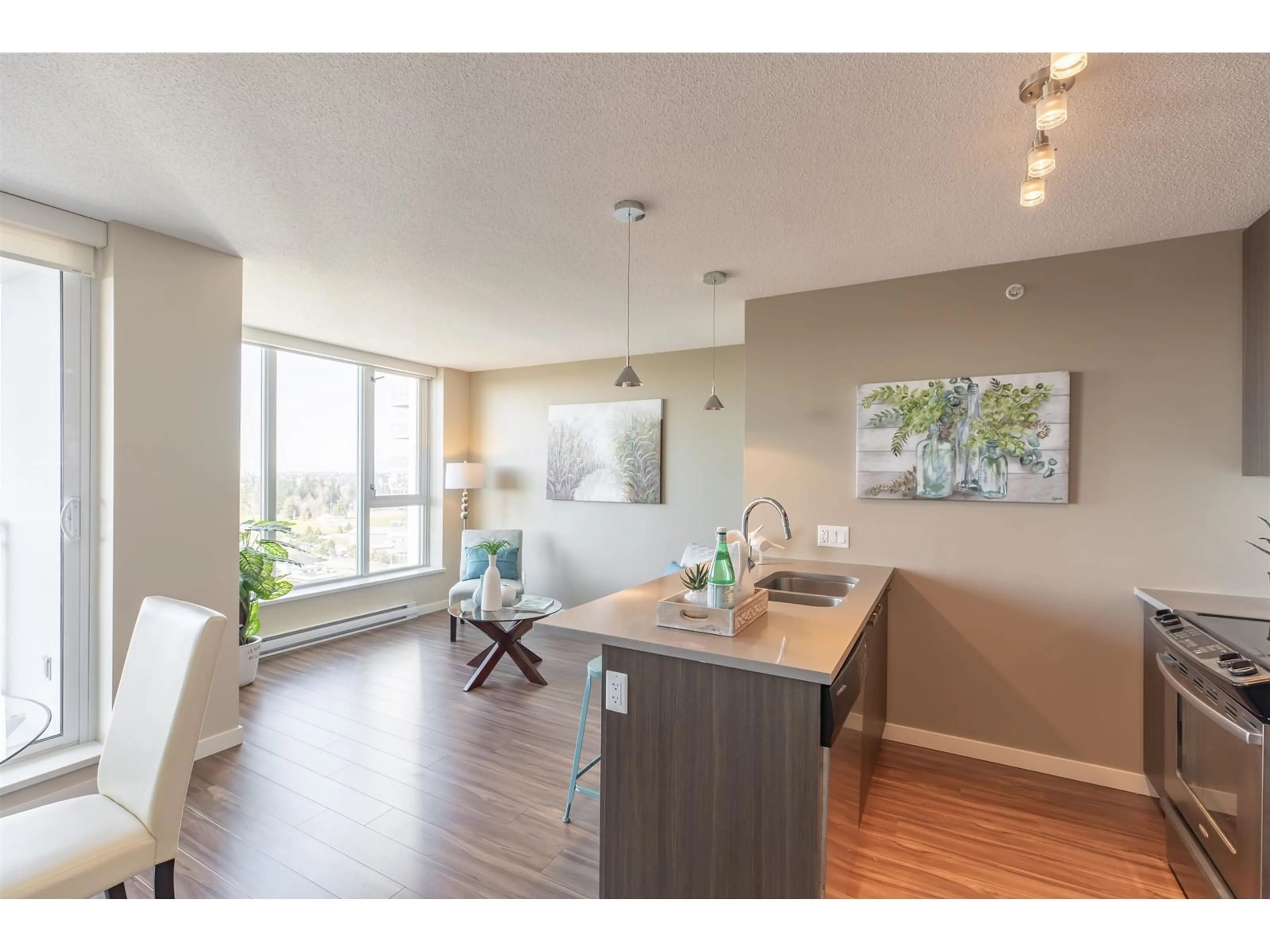 Open concept kitchen, wood/laminate floor for 2215 13325 102A AVENUE, Surrey British Columbia V3T0J5