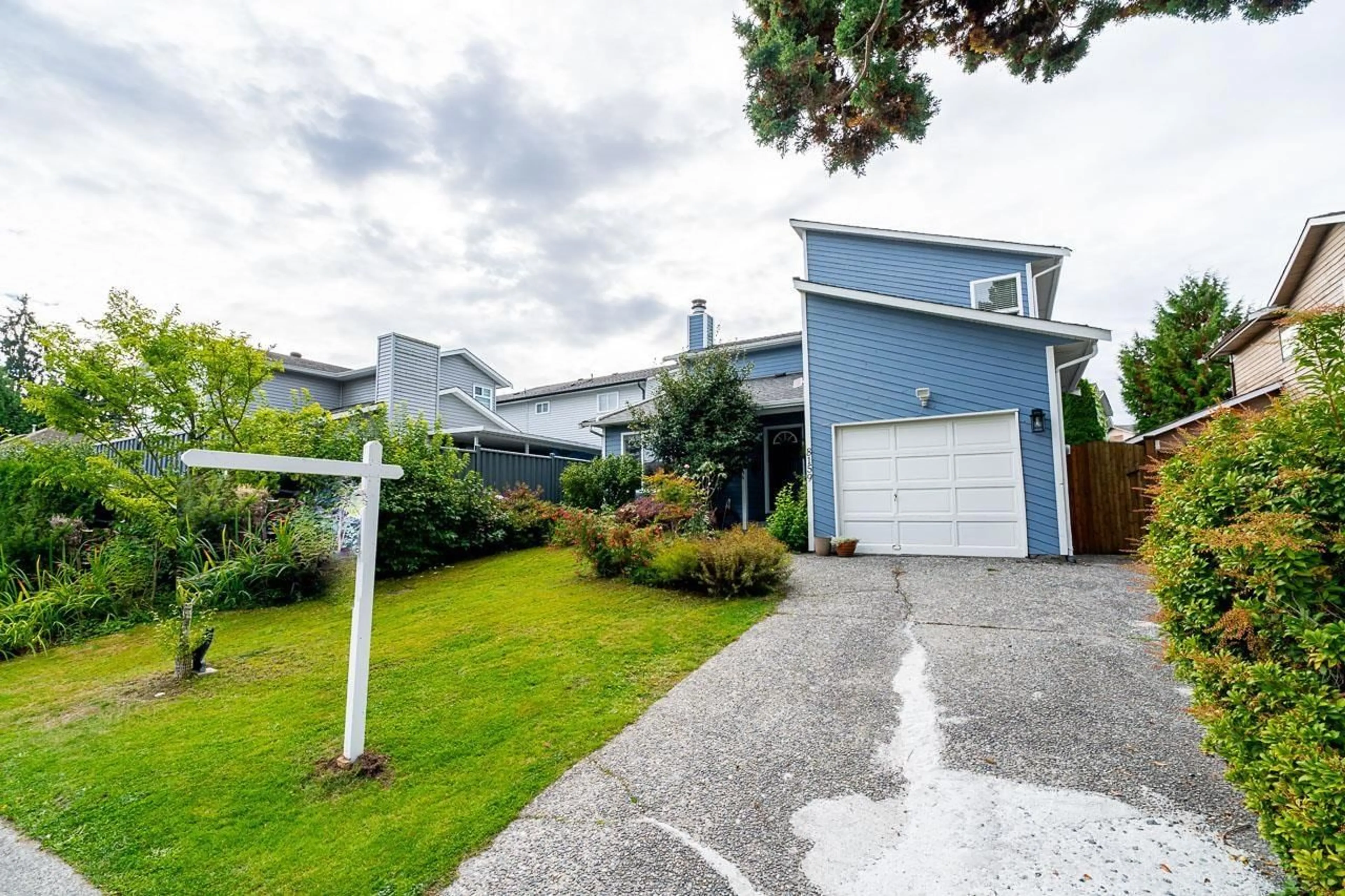 A pic from outside/outdoor area/front of a property/back of a property/a pic from drone, street for 8159 132A STREET, Surrey British Columbia V3W8Y5