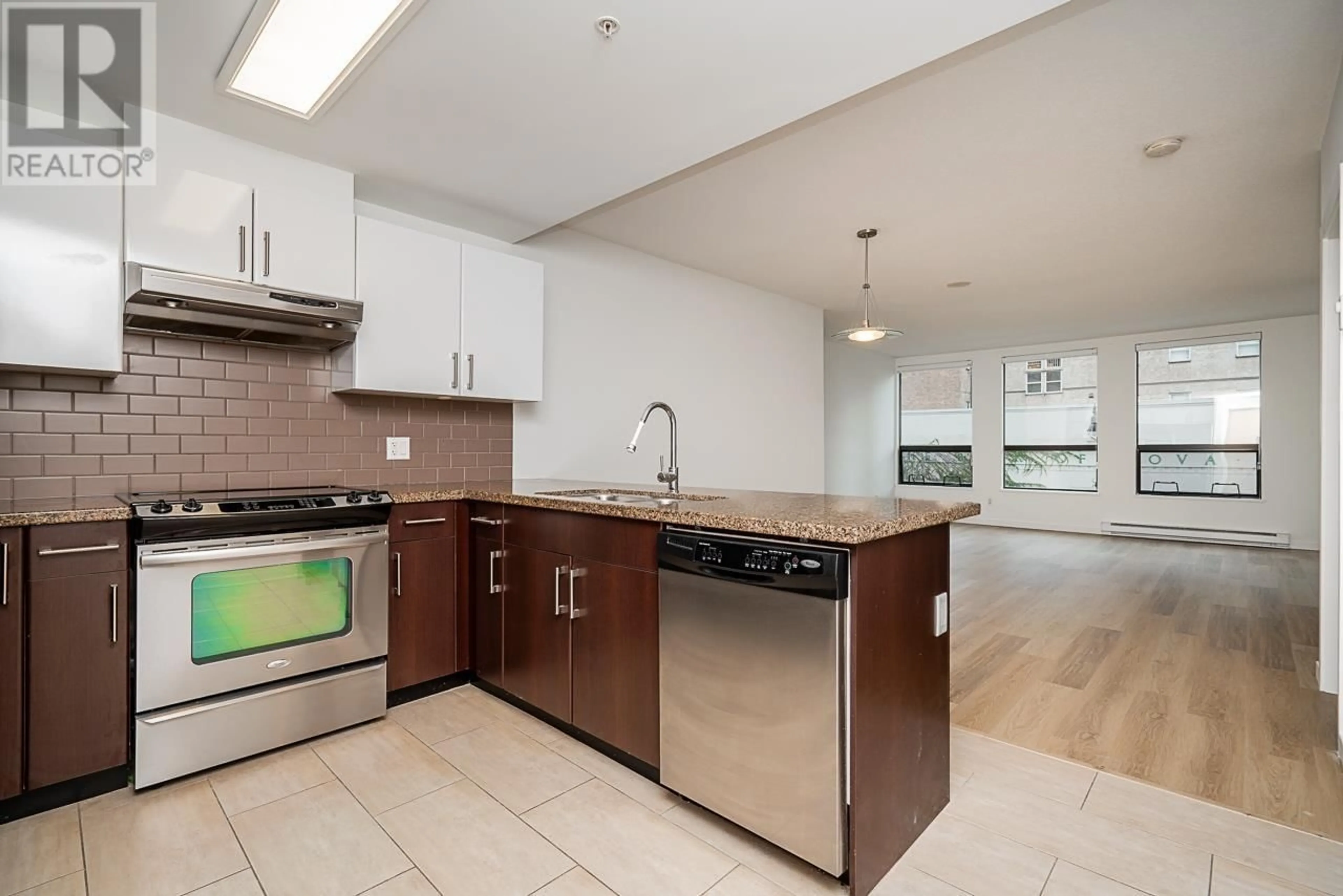 Open concept kitchen, ceramic/tile floor for 306 14 BEGBIE STREET, New Westminster British Columbia V3M0C4