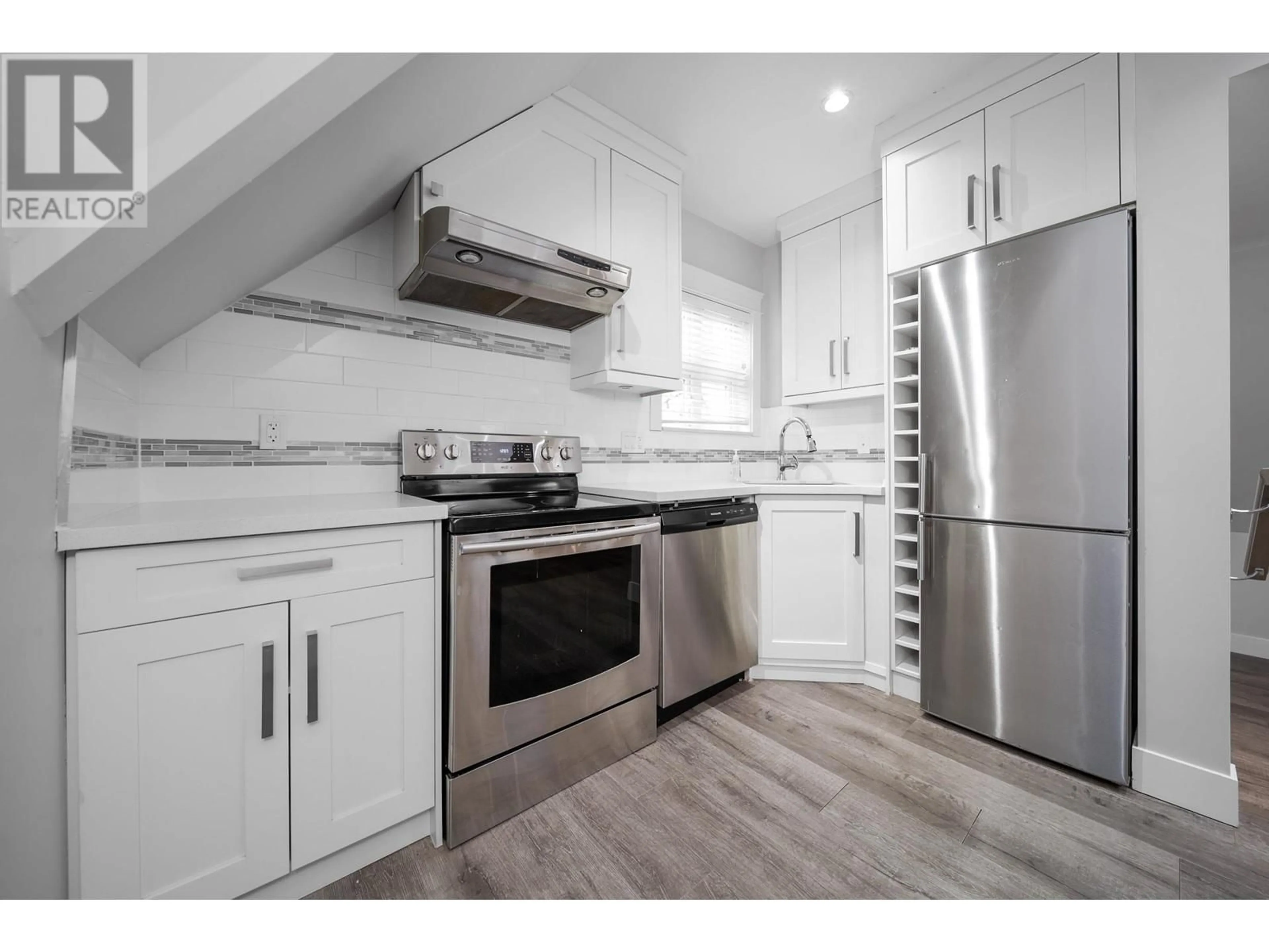 Standard kitchen, wood/laminate floor for 4513 NANAIMO STREET, Vancouver British Columbia V5N5J2