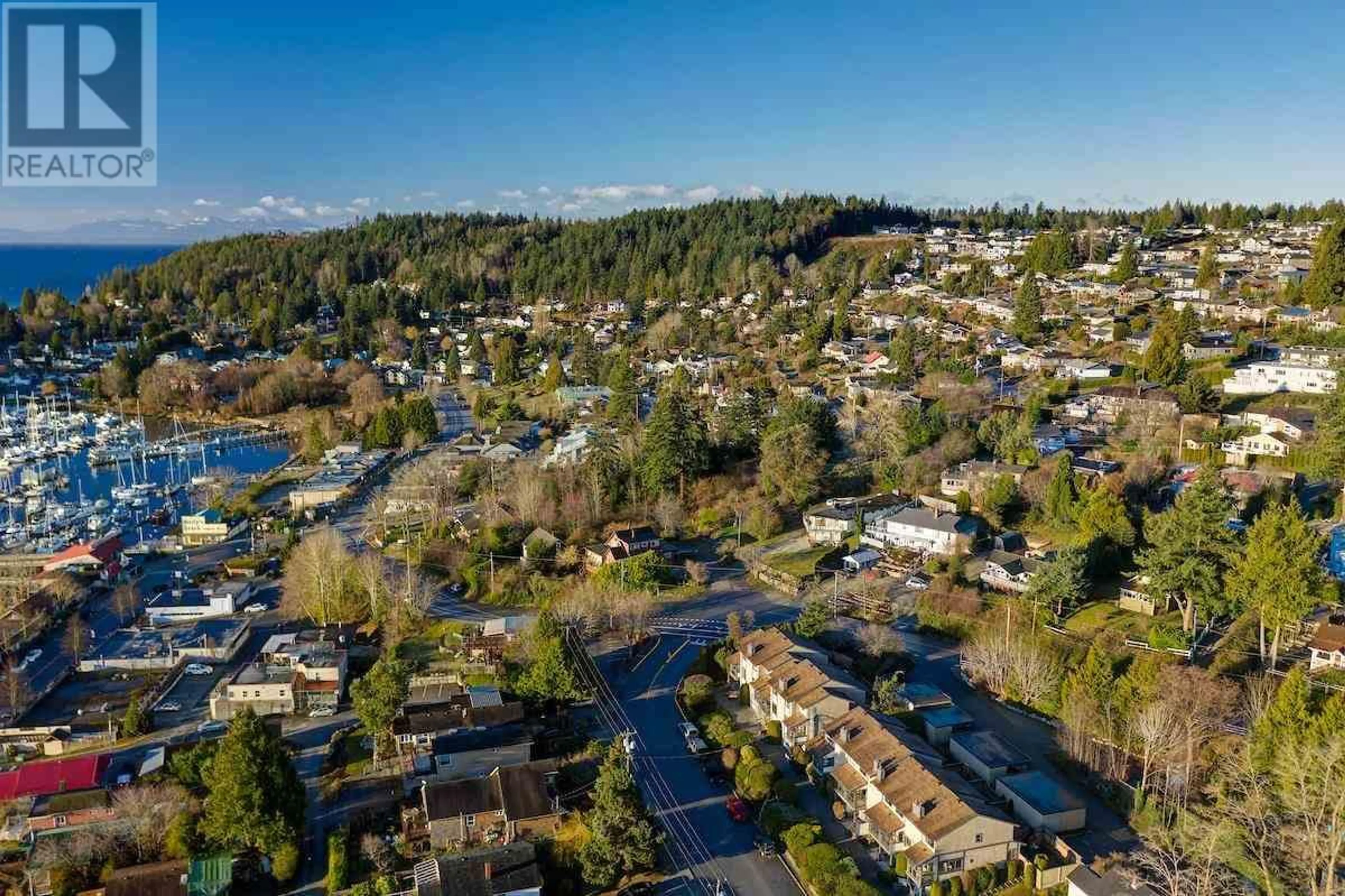 A pic from outside/outdoor area/front of a property/back of a property/a pic from drone, water/lake/river/ocean view for 537 GIBSONS WAY, Gibsons British Columbia V0N1V9