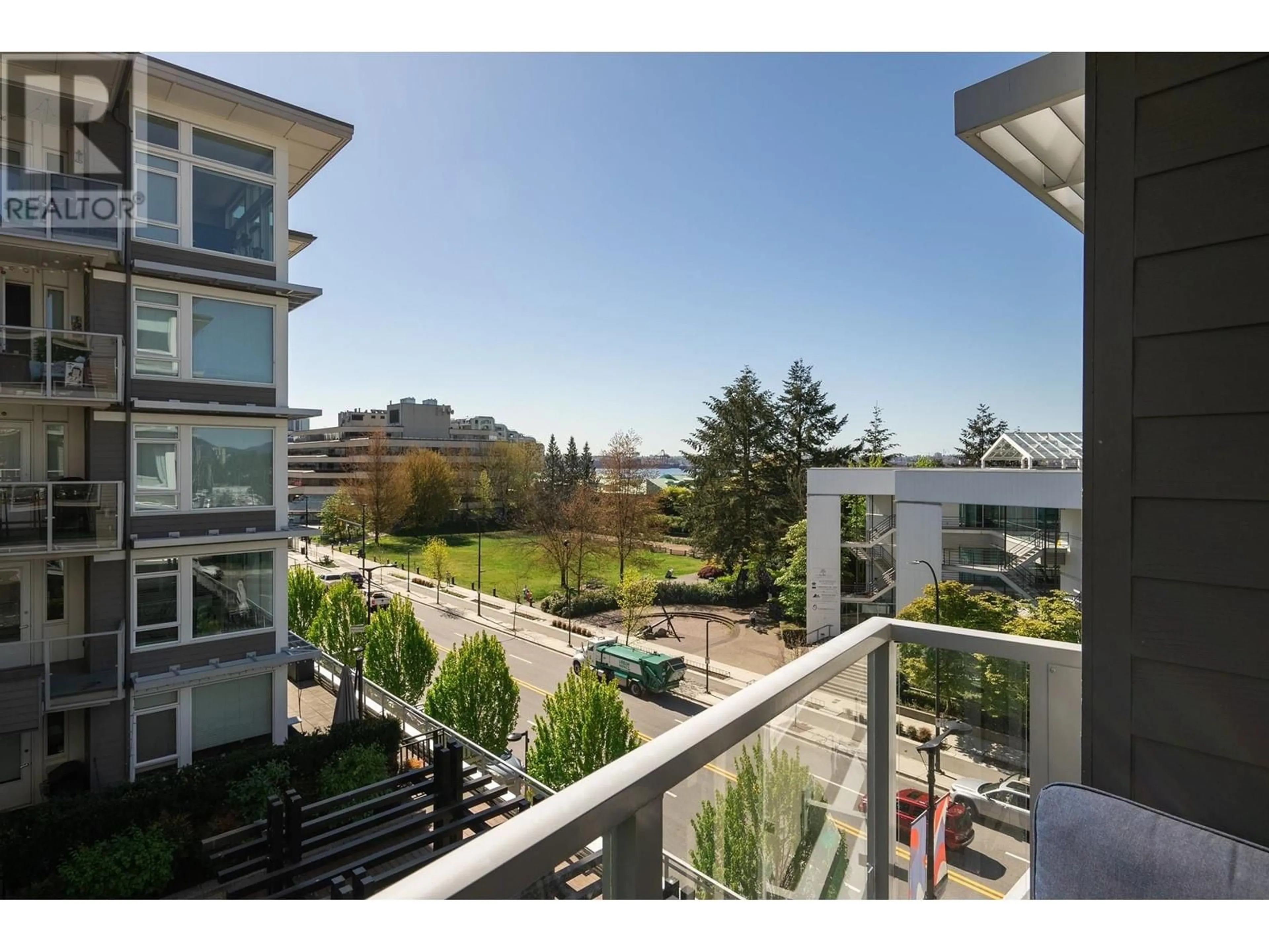 Patio, city buildings view from balcony for 306 277 W 1ST STREET, North Vancouver British Columbia V7M0E8