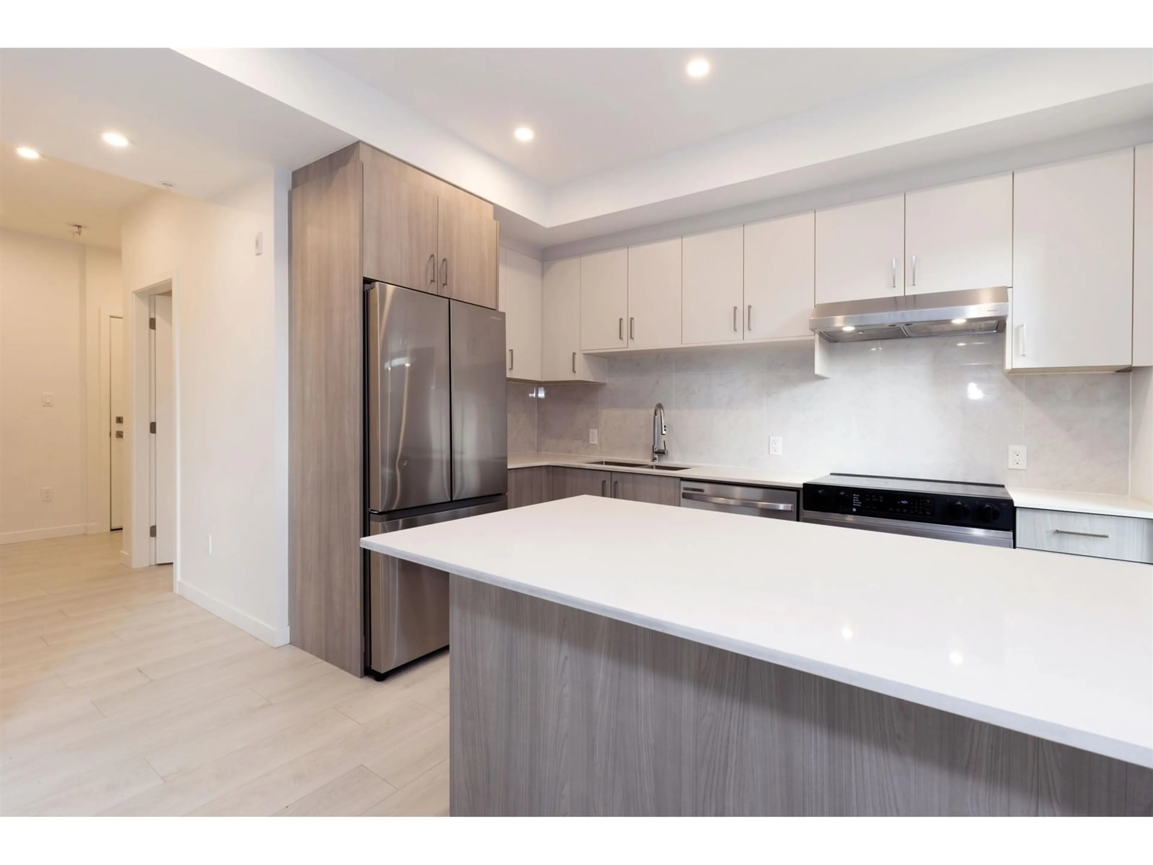 Open concept kitchen, unknown for 201 - 13838 108 AVE, Surrey British Columbia V3T0T8