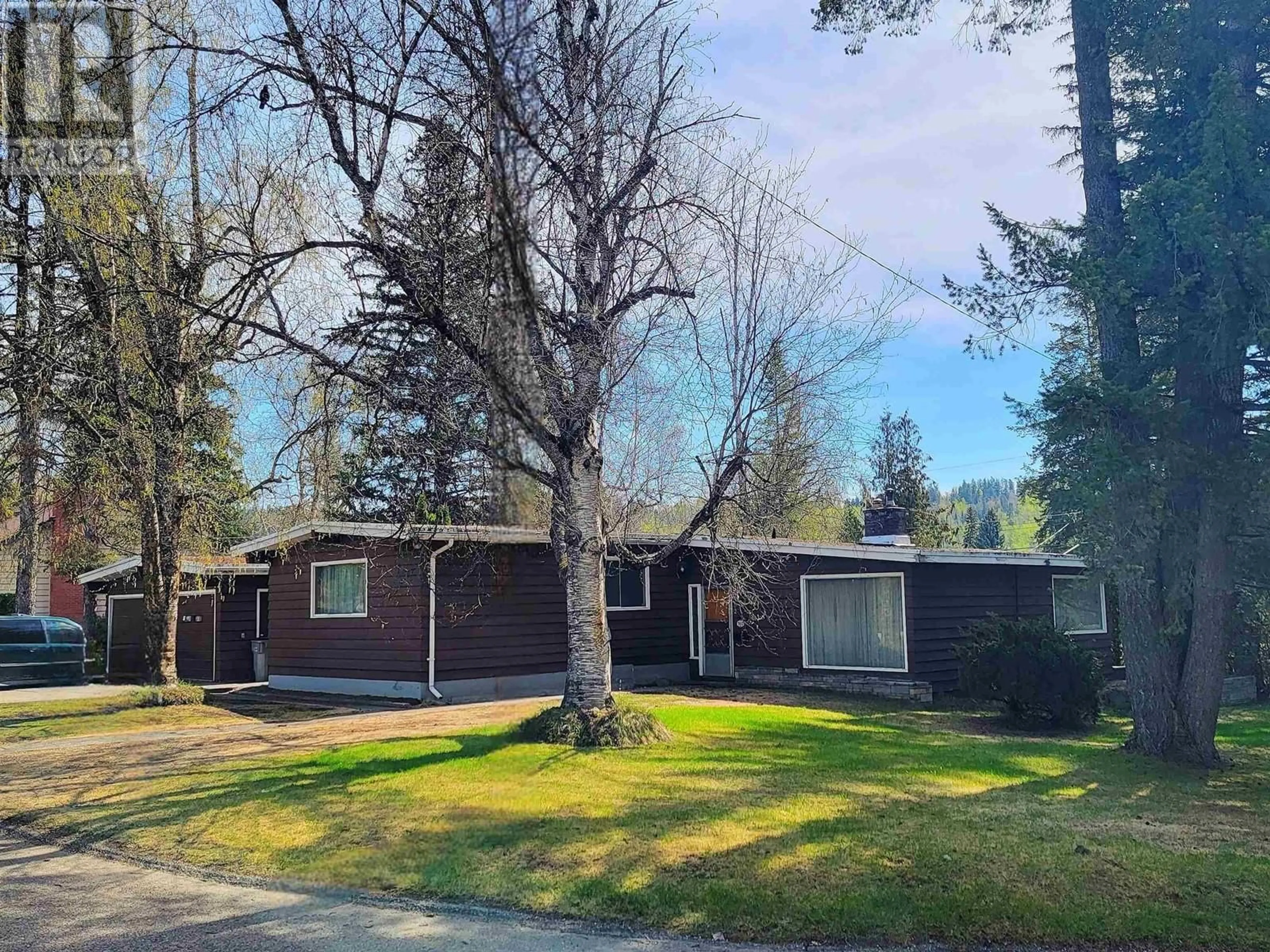 A pic from outside/outdoor area/front of a property/back of a property/a pic from drone, street for 910 GRAHAM AVENUE, Quesnel British Columbia V2J3C8