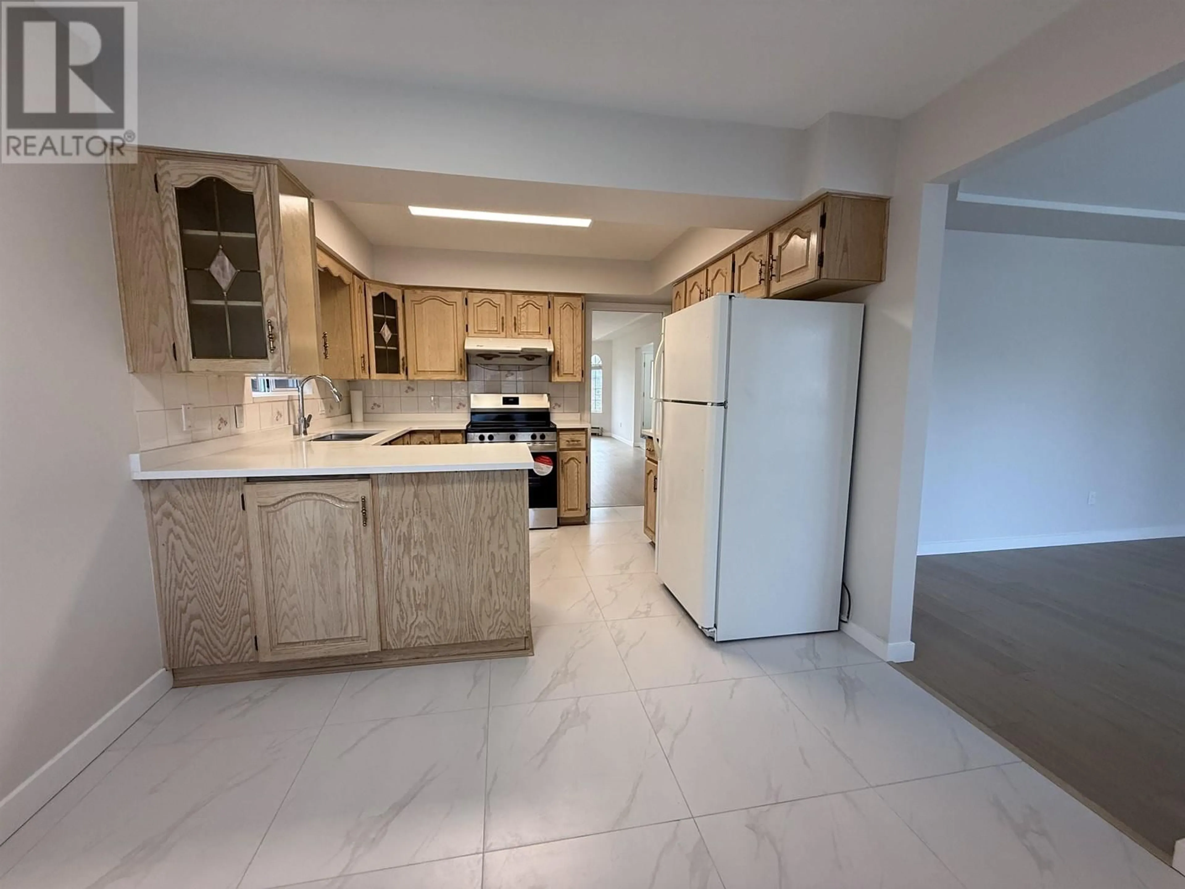 Standard kitchen, ceramic/tile floor for 2141 E 51ST AVENUE, Vancouver British Columbia V5P1W2