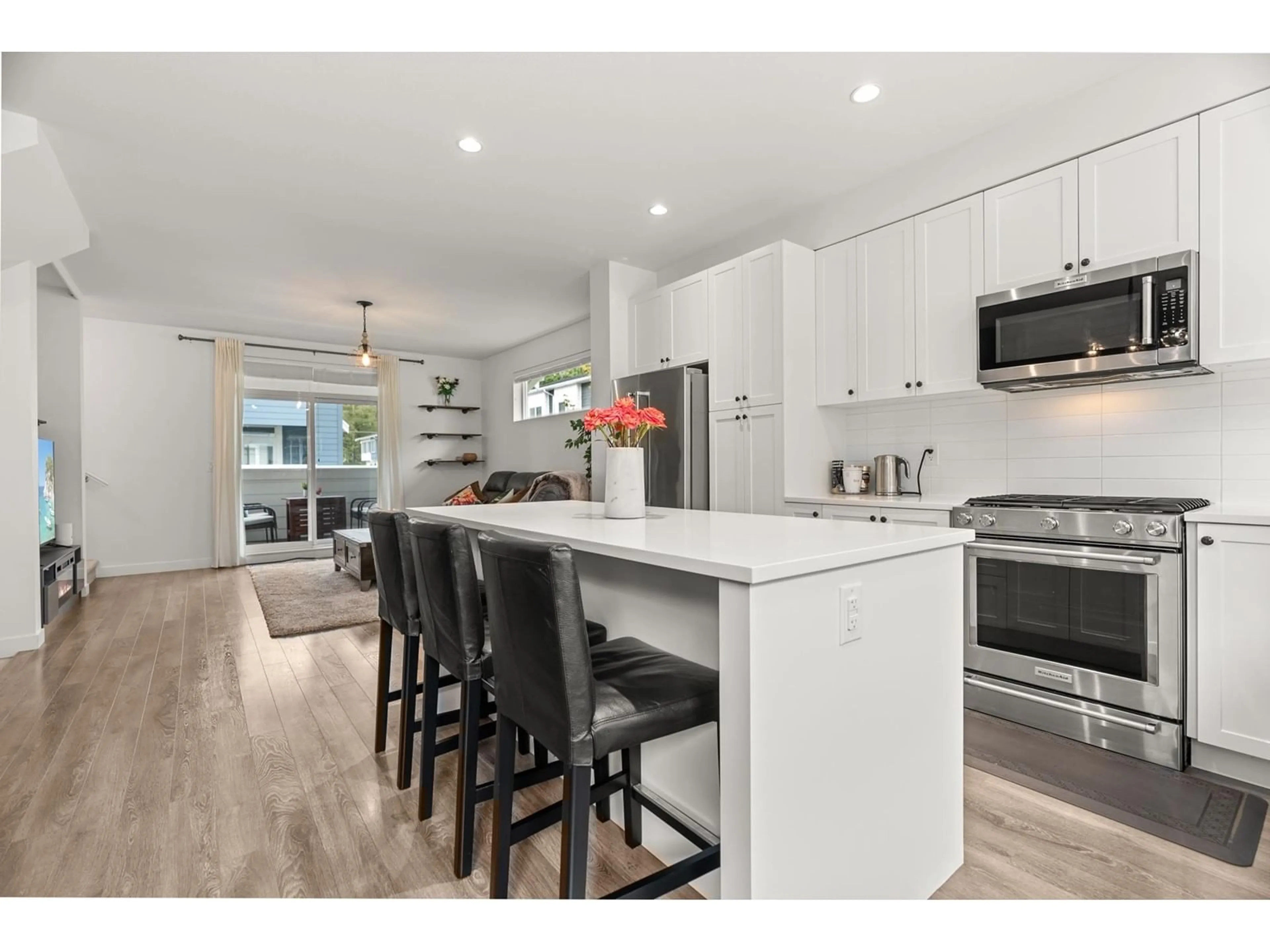 Open concept kitchen, wood/laminate floor for 63 158 171 STREET, Surrey British Columbia V3Z0X1