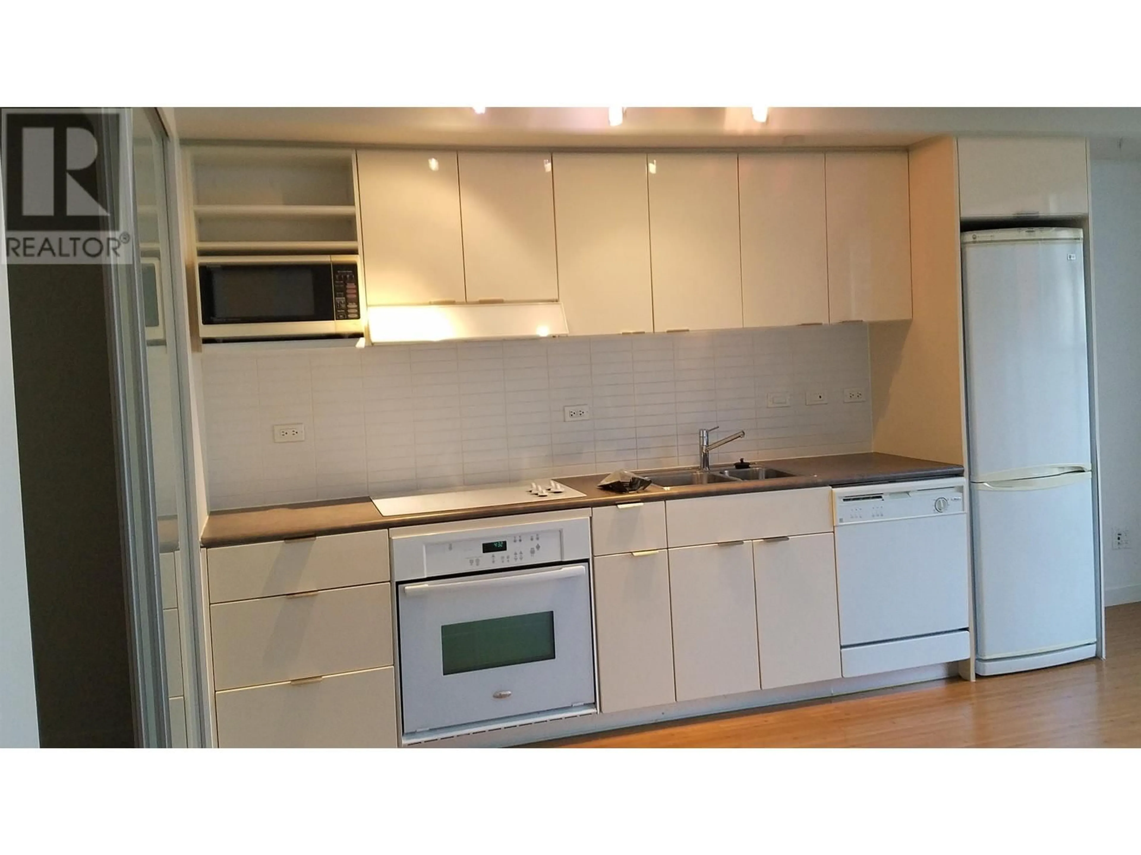 Standard kitchen, wood/laminate floor for 816 168 POWELL STREET, Vancouver British Columbia V6A0B2