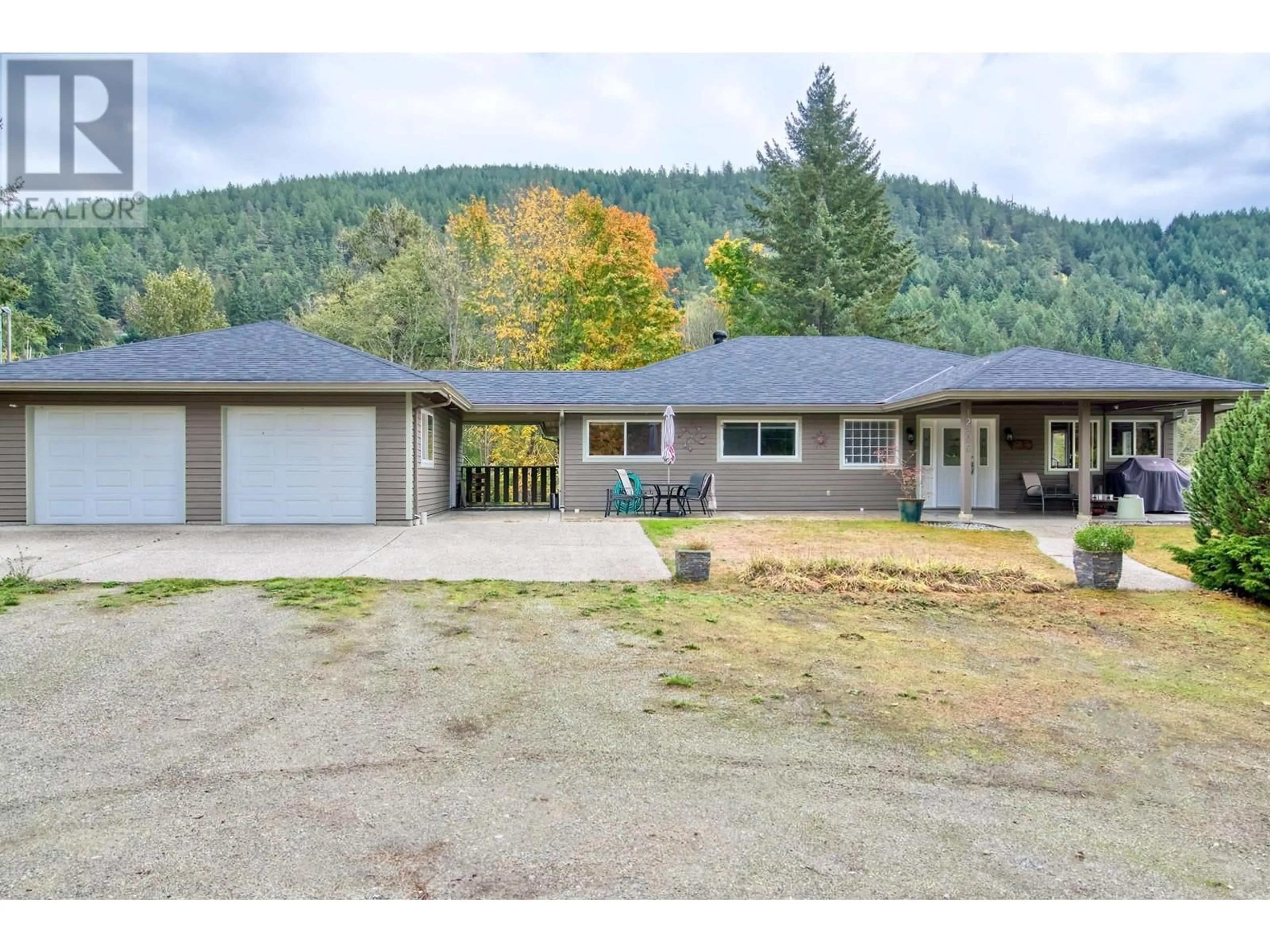 A pic from outside/outdoor area/front of a property/back of a property/a pic from drone, mountain view for 12800-12810 MAINSAIL ROAD, Madeira Park British Columbia V0N2H0