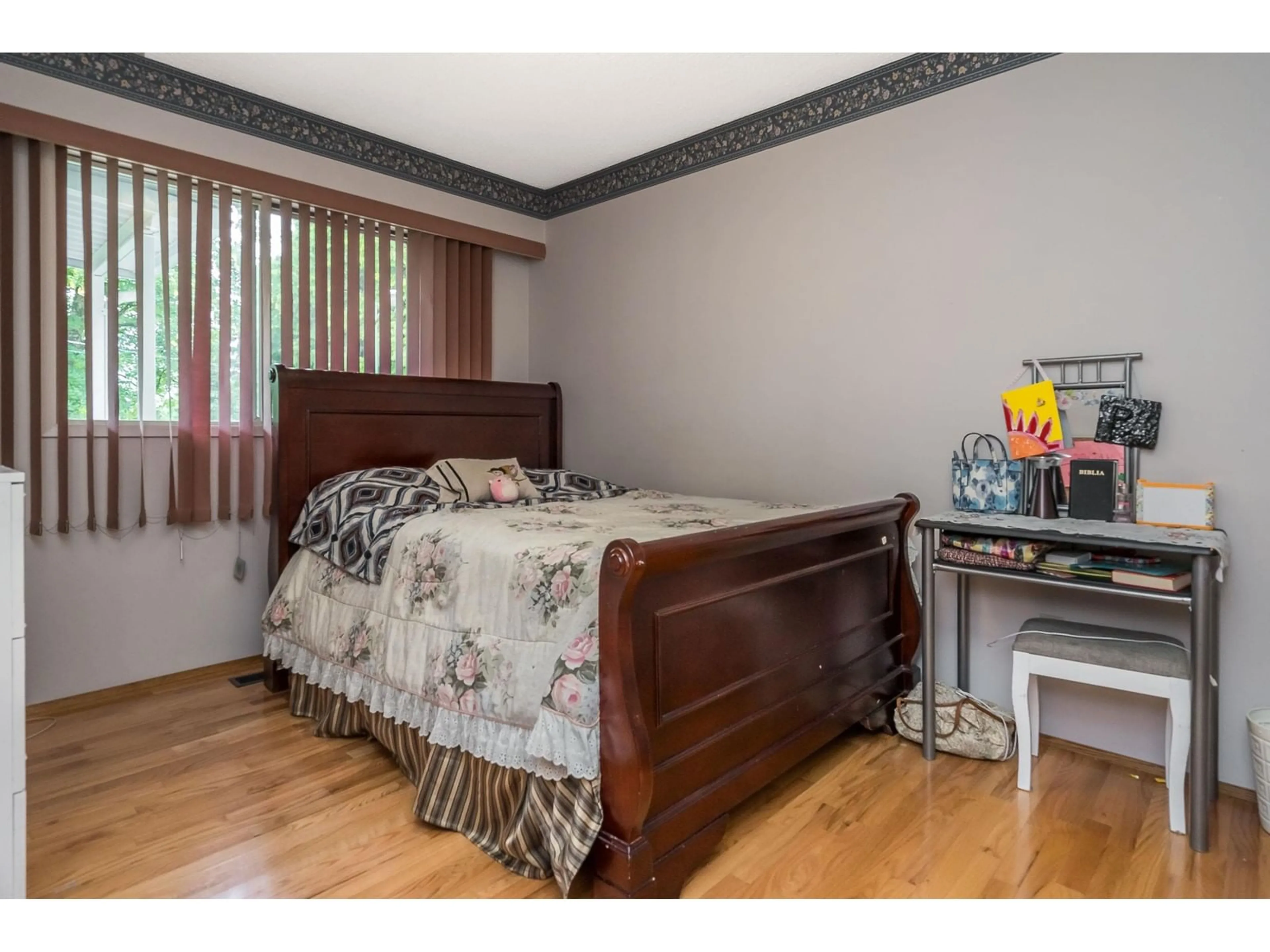 Bedroom with bed, wood/laminate floor for 1559 WHATCOM, Abbotsford British Columbia V3G1Y9