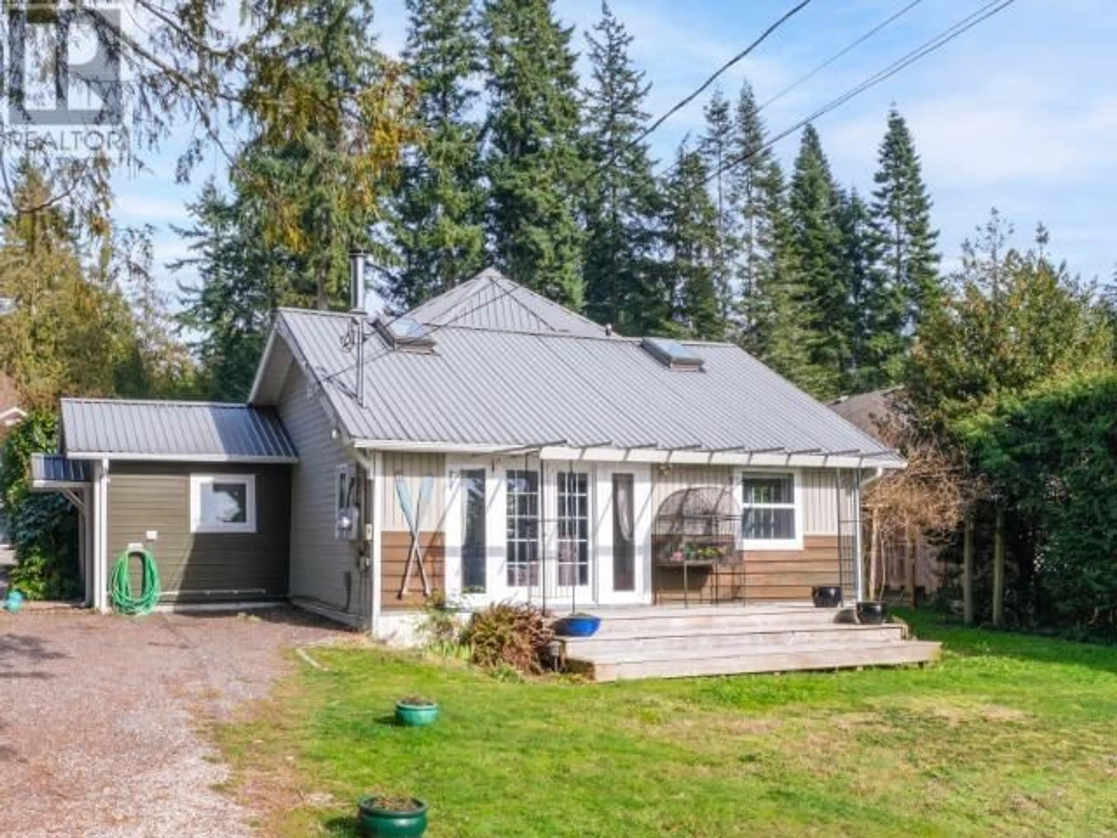 A pic from outside/outdoor area/front of a property/back of a property/a pic from drone, street for 8098 REDROOFFS ROAD, Halfmoon Bay British Columbia V7Z1C7