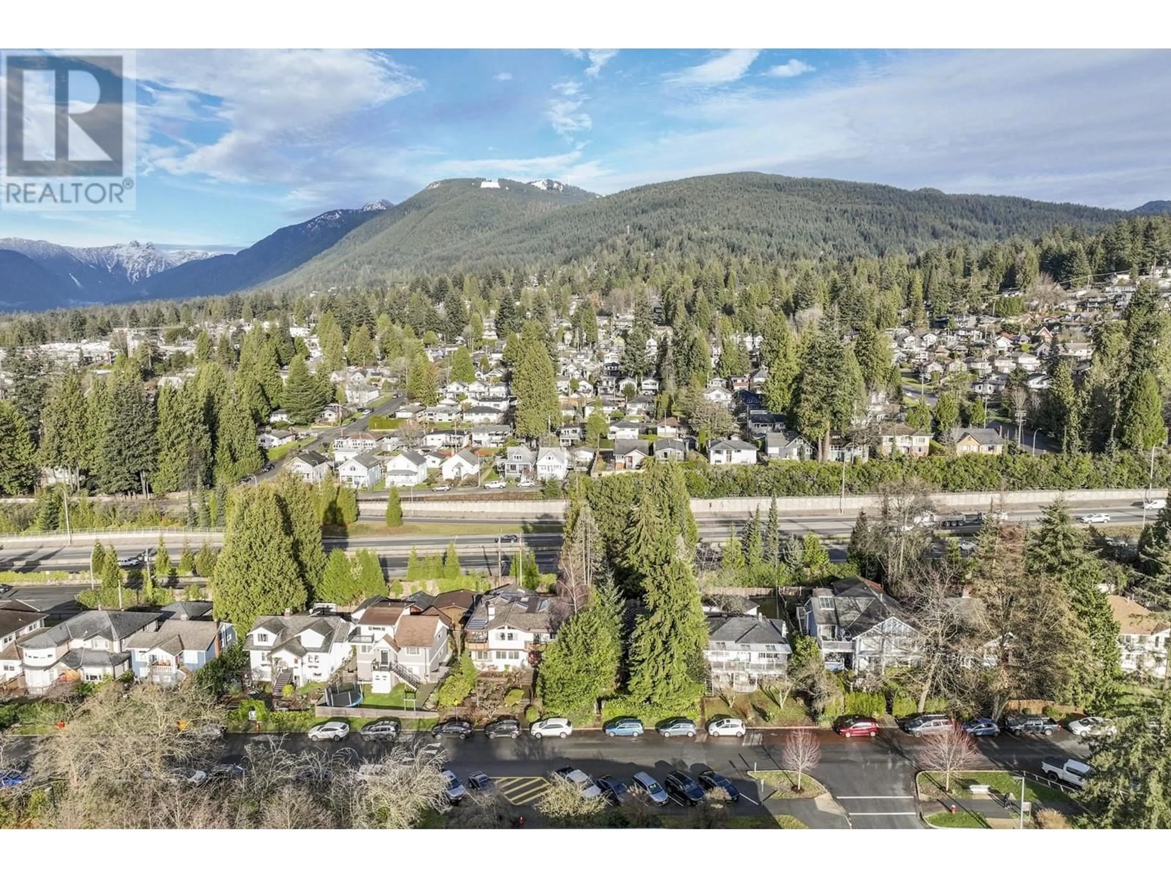 A pic from outside/outdoor area/front of a property/back of a property/a pic from drone, mountain view for 234 E 24TH STREET, North Vancouver British Columbia V7L3E7