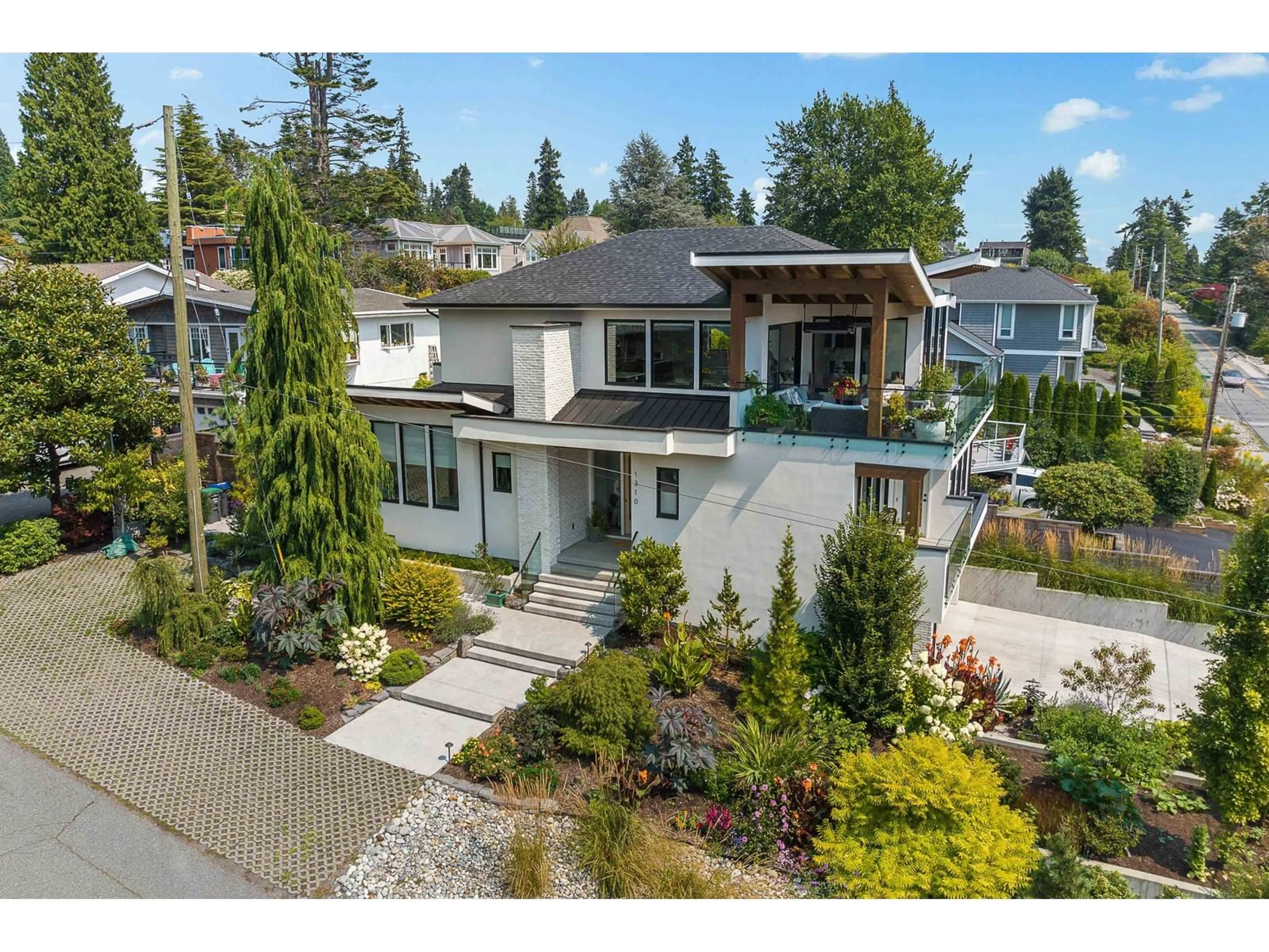 A pic from outside/outdoor area/front of a property/back of a property/a pic from drone, street for 1310 129 STREET, Surrey British Columbia V4A3X8