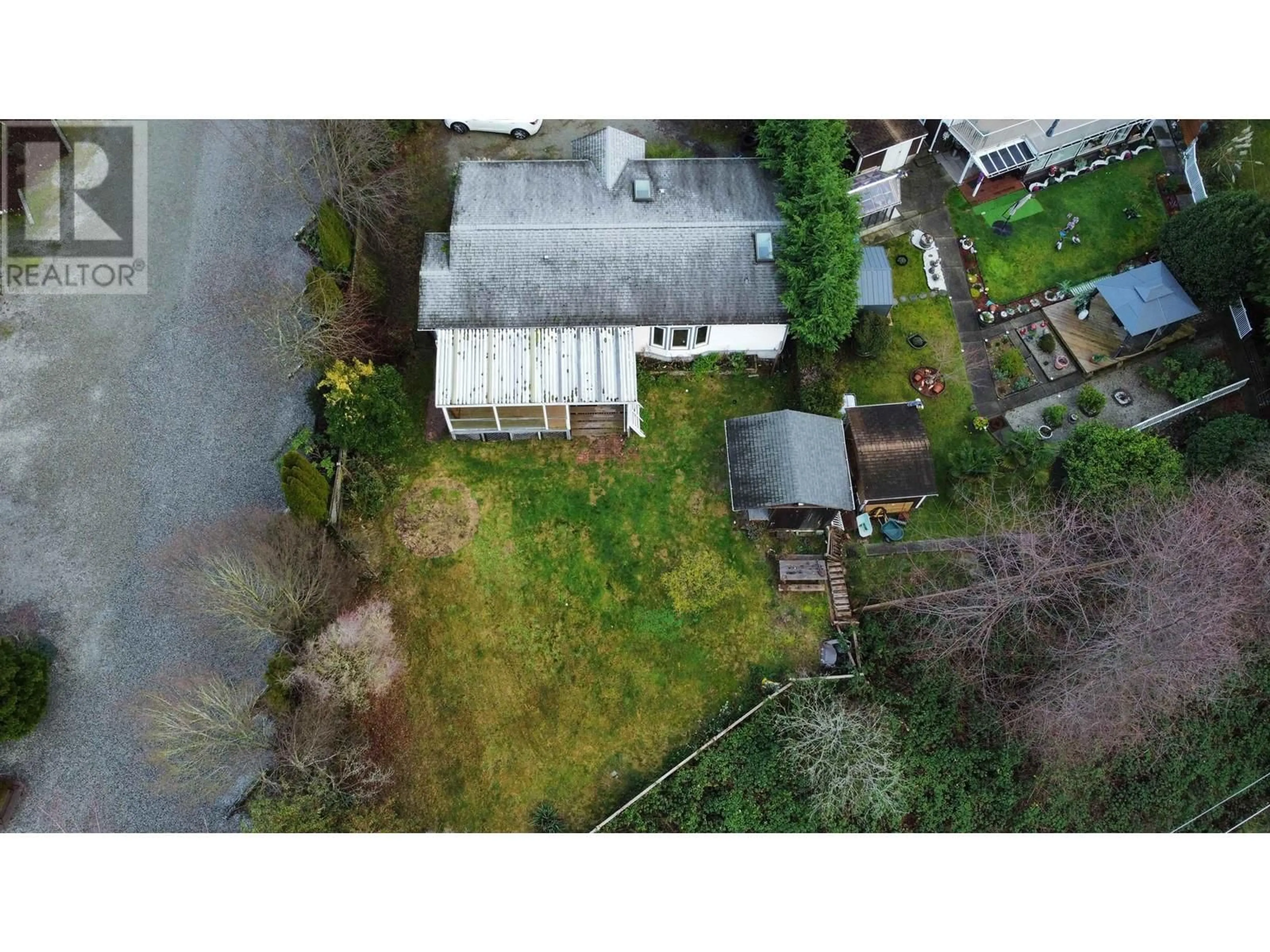 A pic from outside/outdoor area/front of a property/back of a property/a pic from drone, street for 4933 GEER ROAD, Sechelt British Columbia V7Z0B7