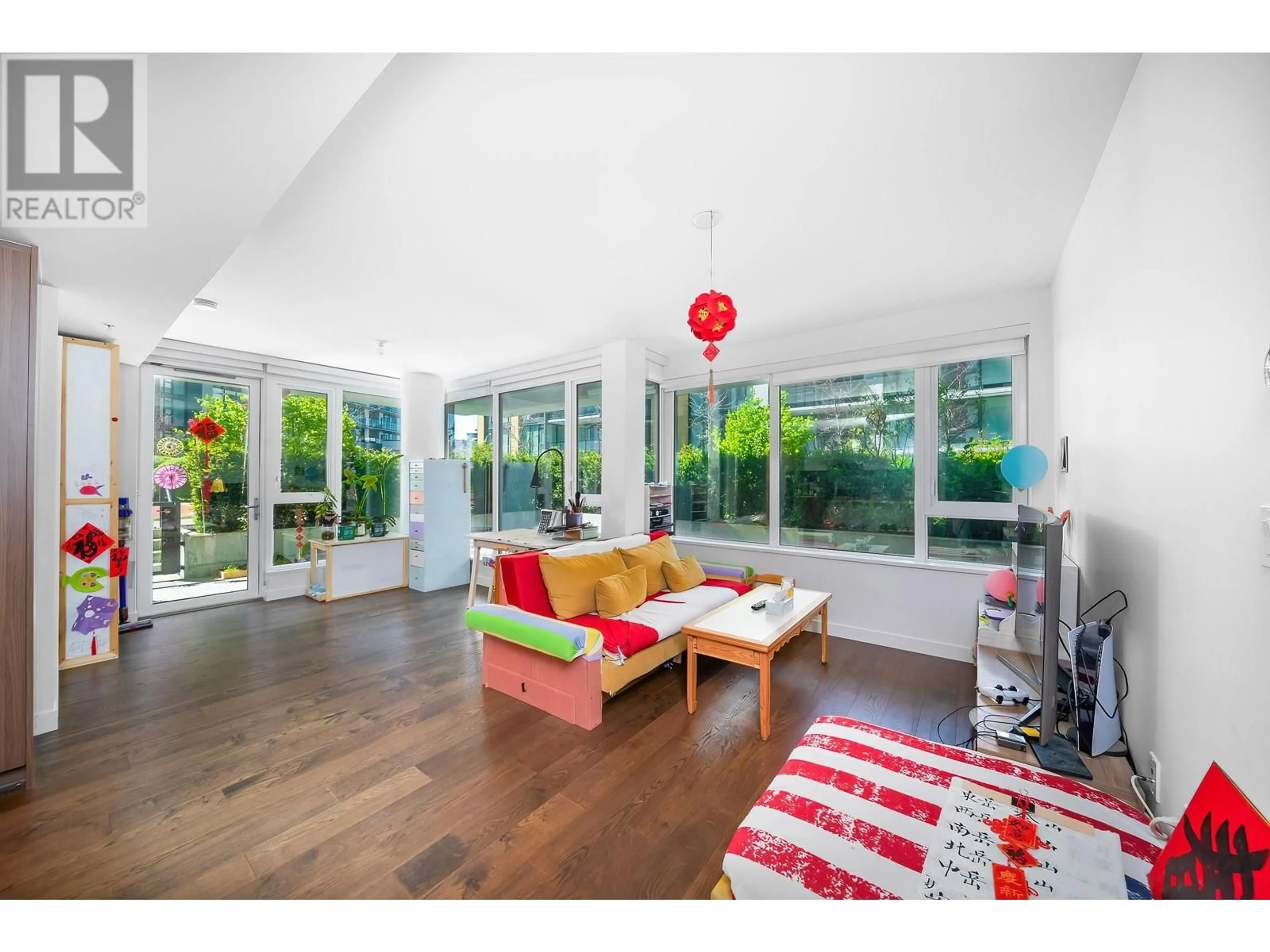 Living room with furniture, wood/laminate floor for 507 - 8160 MCMYN WAY, Richmond British Columbia V6X0V2