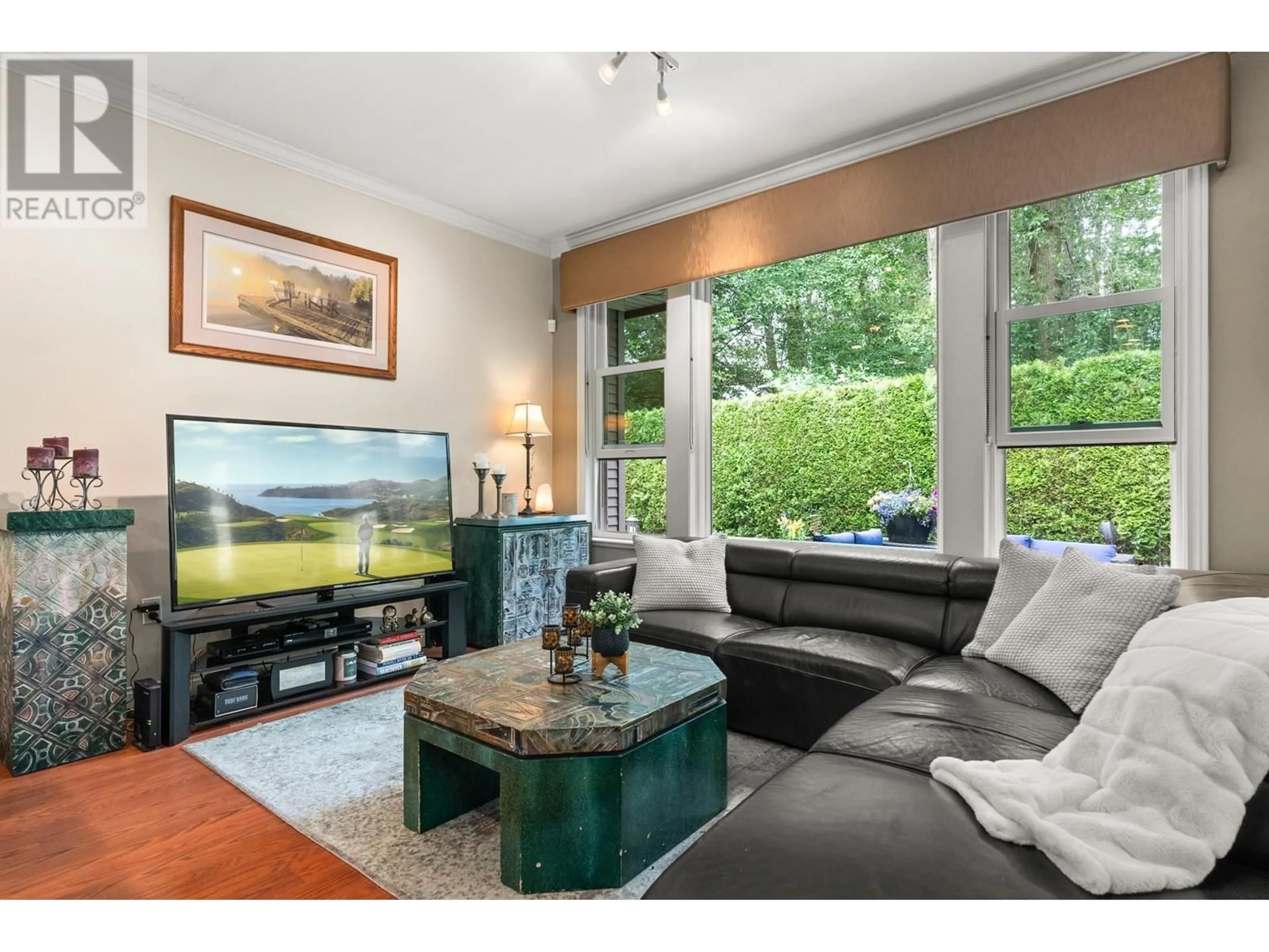 Living room with furniture, wood/laminate floor for 15 - 6105 RIVER ROAD, Delta British Columbia V4K5G5