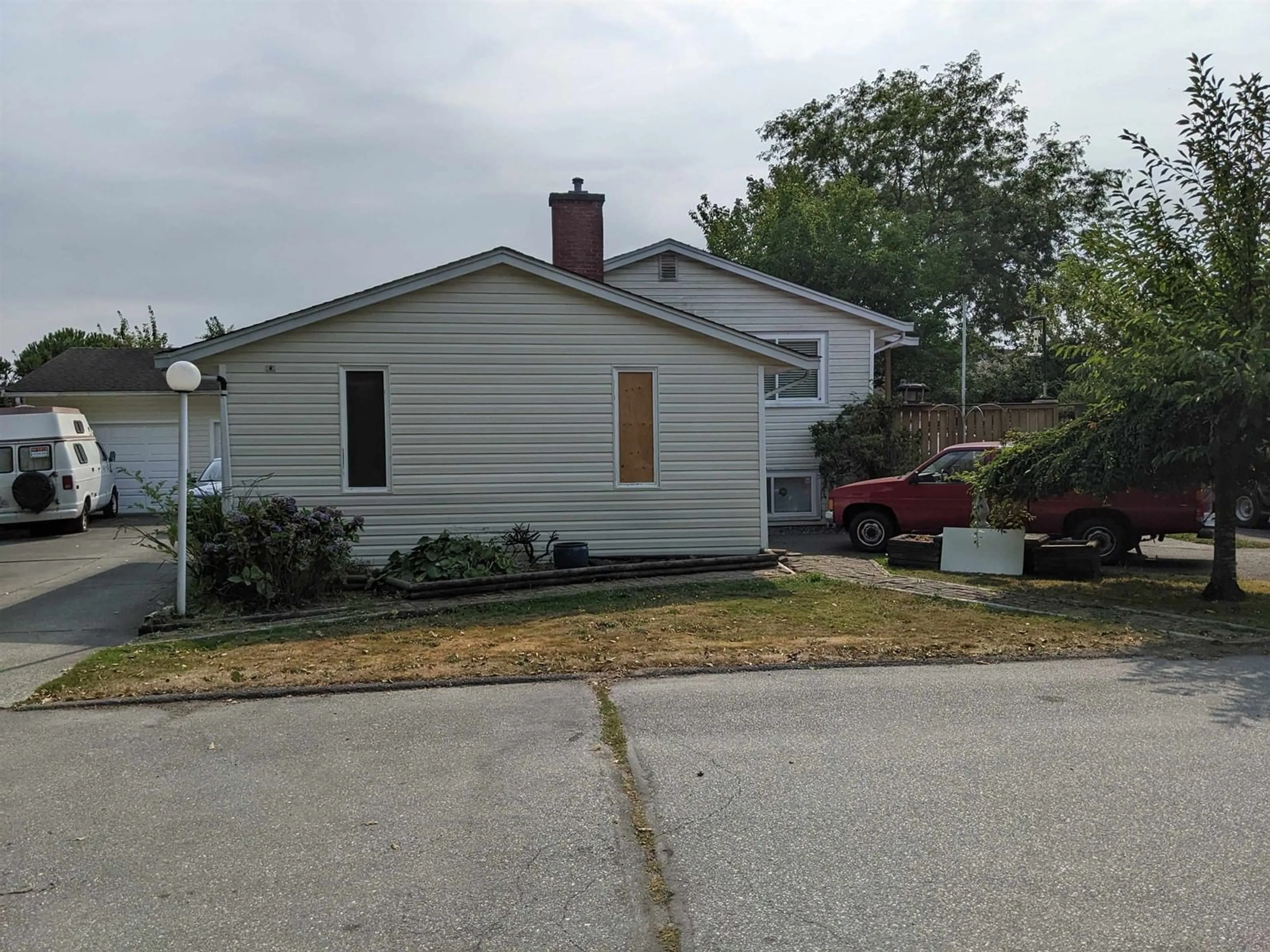 Home with vinyl exterior material, street for 16428 12, Surrey British Columbia V4A9H6