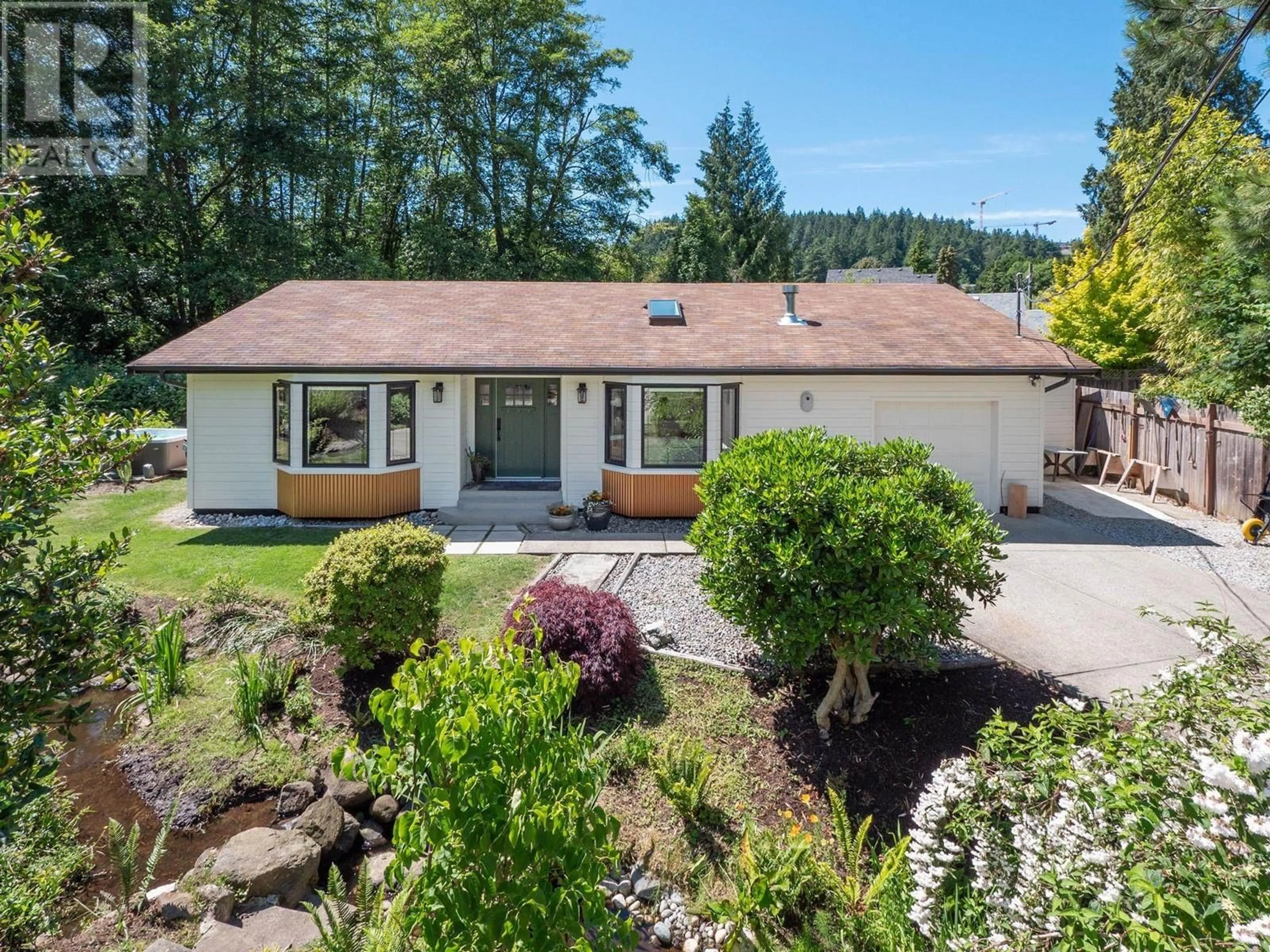 A pic from outside/outdoor area/front of a property/back of a property/a pic from drone, street for 655 DOUGALL ROAD, Gibsons British Columbia V0N1V8