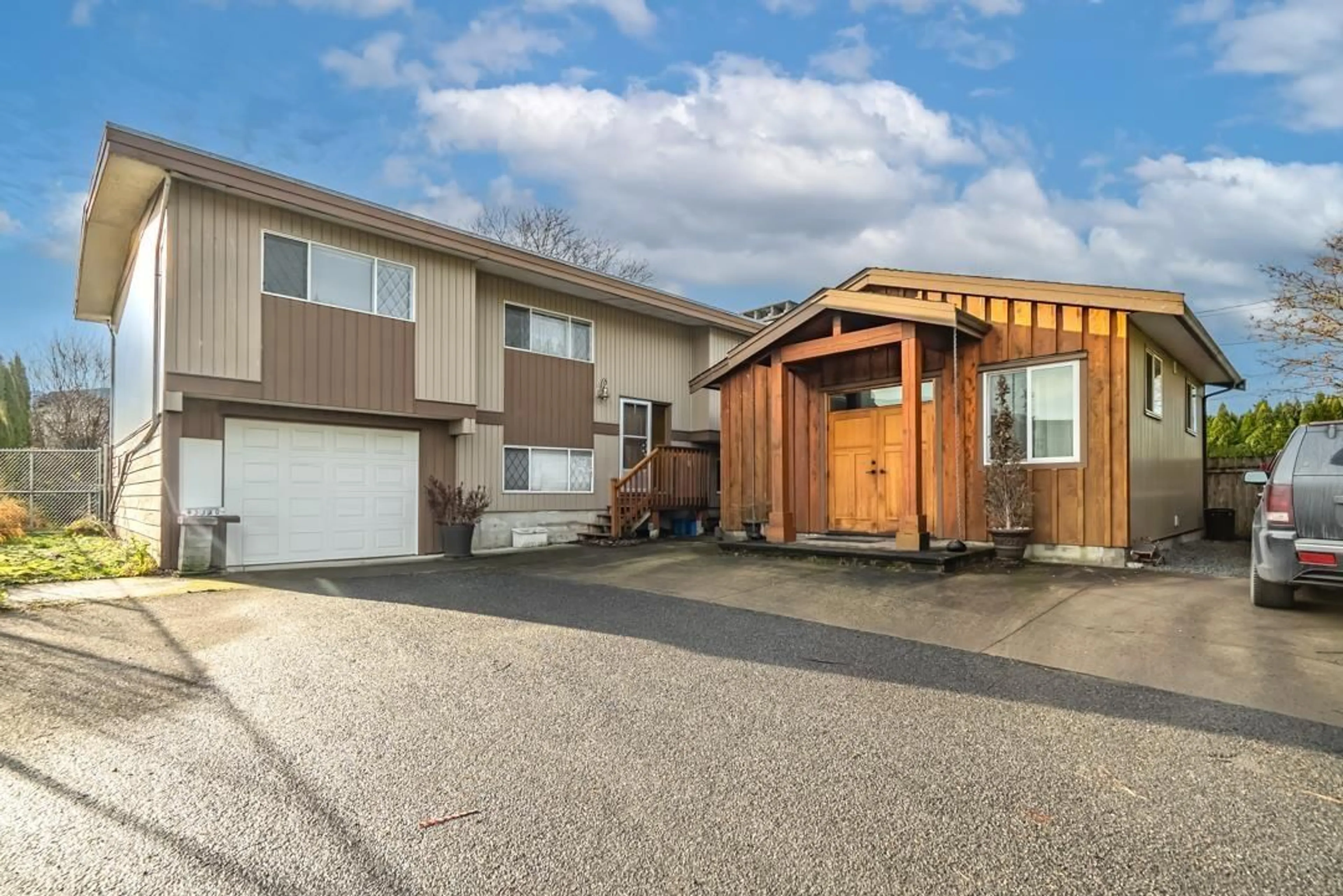 Home with vinyl exterior material, street for 45380 STEVENSON ROAD|Sardis South, Chilliwack British Columbia V2R2Z7