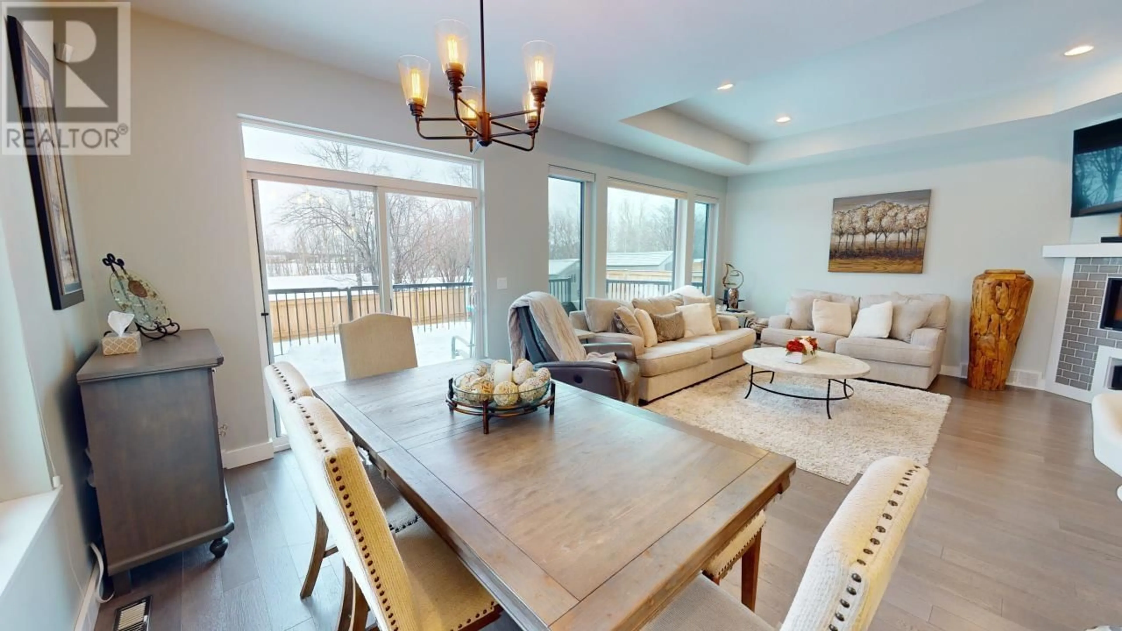 Dining room, wood/laminate floor for 11024 108 AVENUE, Fort St. John British Columbia V1J0E3