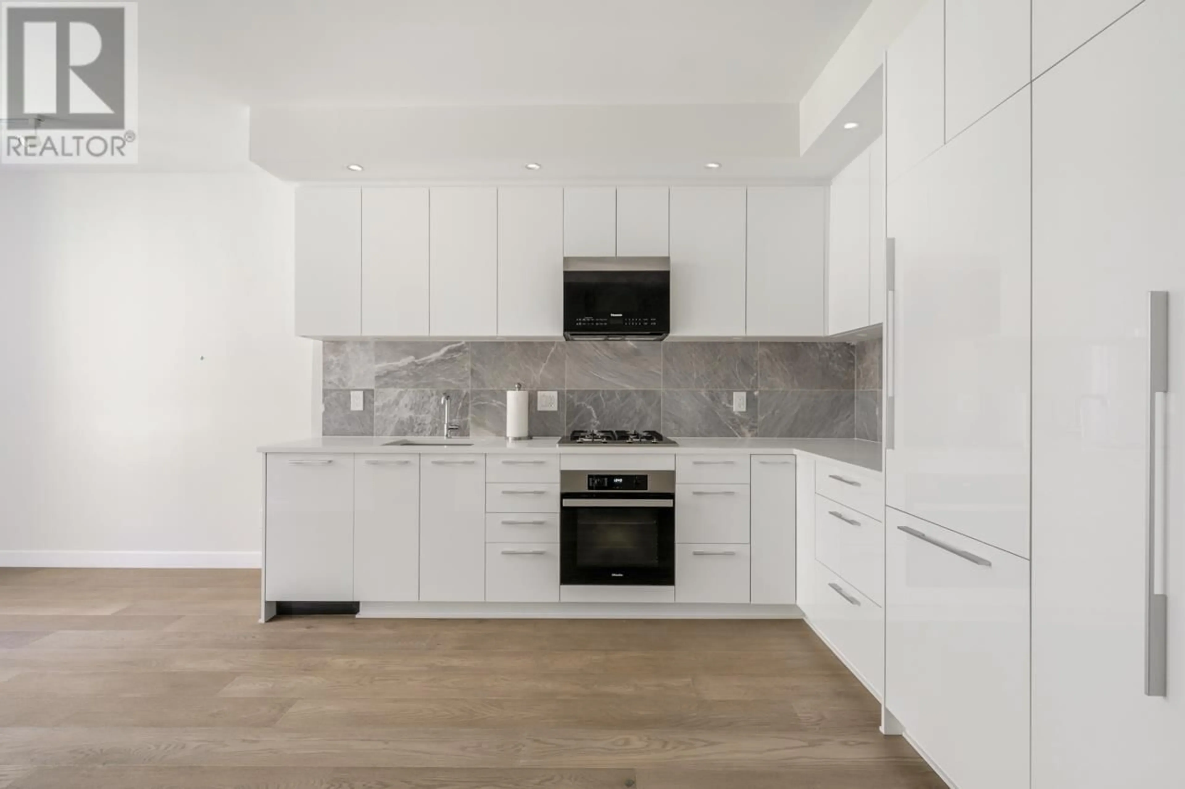 Open concept kitchen, unknown for 708 5608 BERTON AVENUE, Vancouver British Columbia V6S0M6