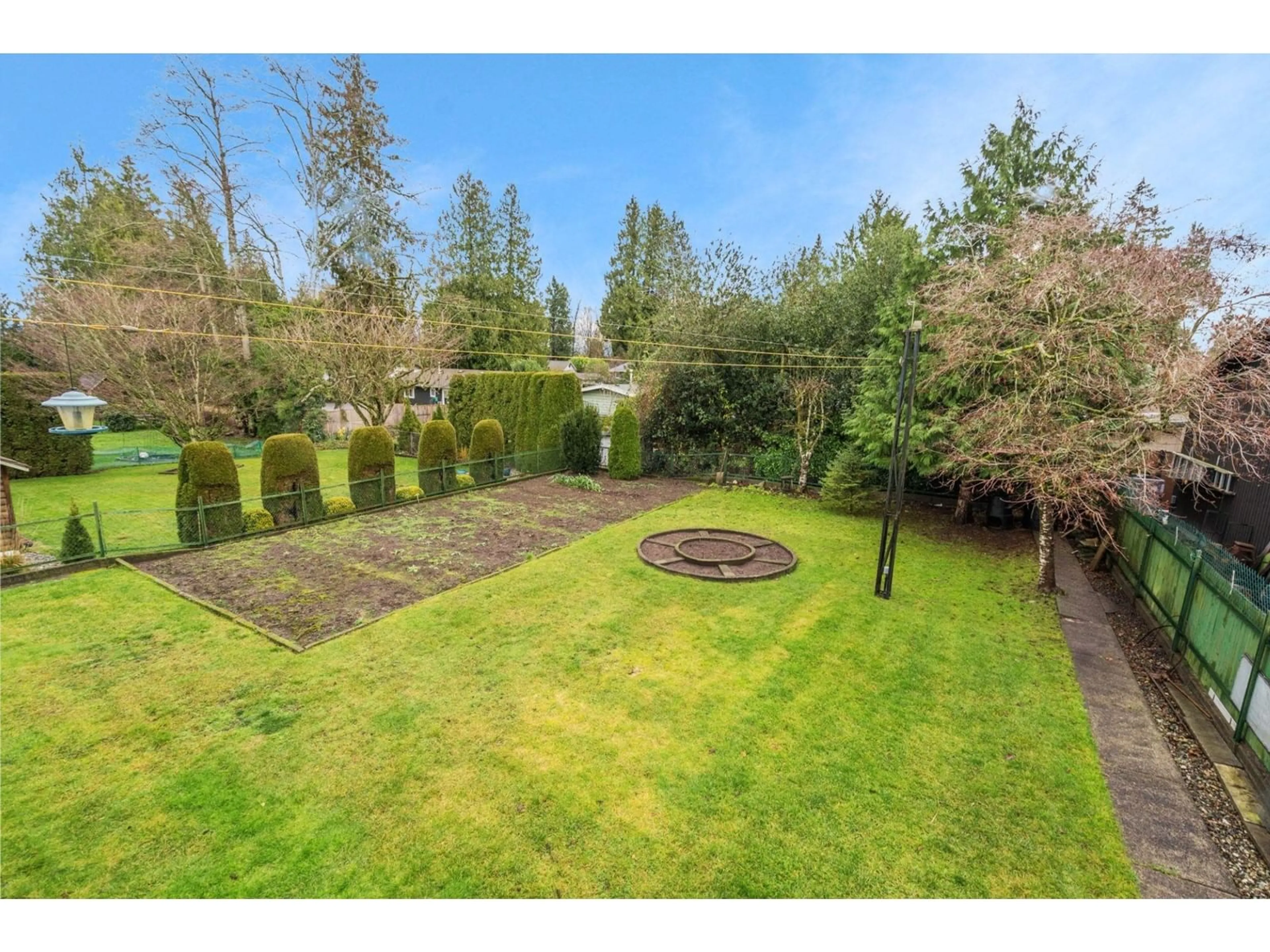 A pic from outside/outdoor area/front of a property/back of a property/a pic from drone, forest/trees view for 4924 197A STREET, Langley British Columbia V3A6W1