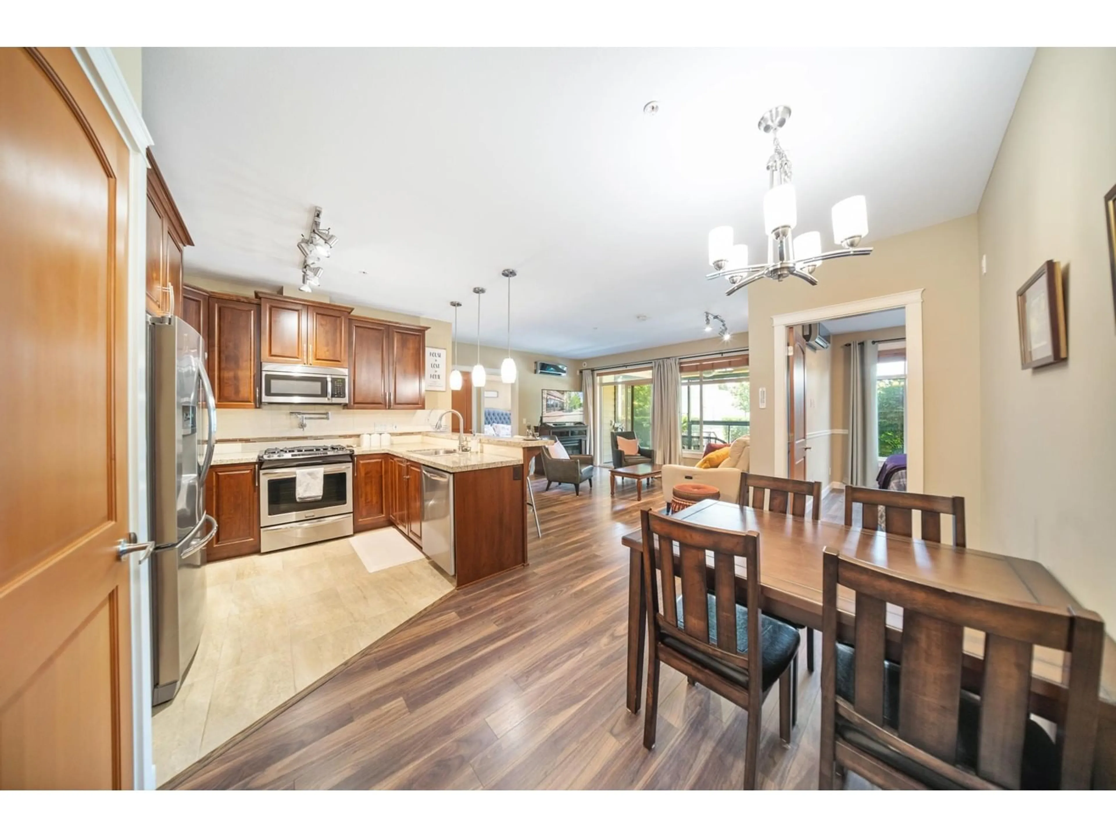 Open concept kitchen, unknown for 104 2860 TRETHEWEY STREET, Abbotsford British Columbia V2T0G5