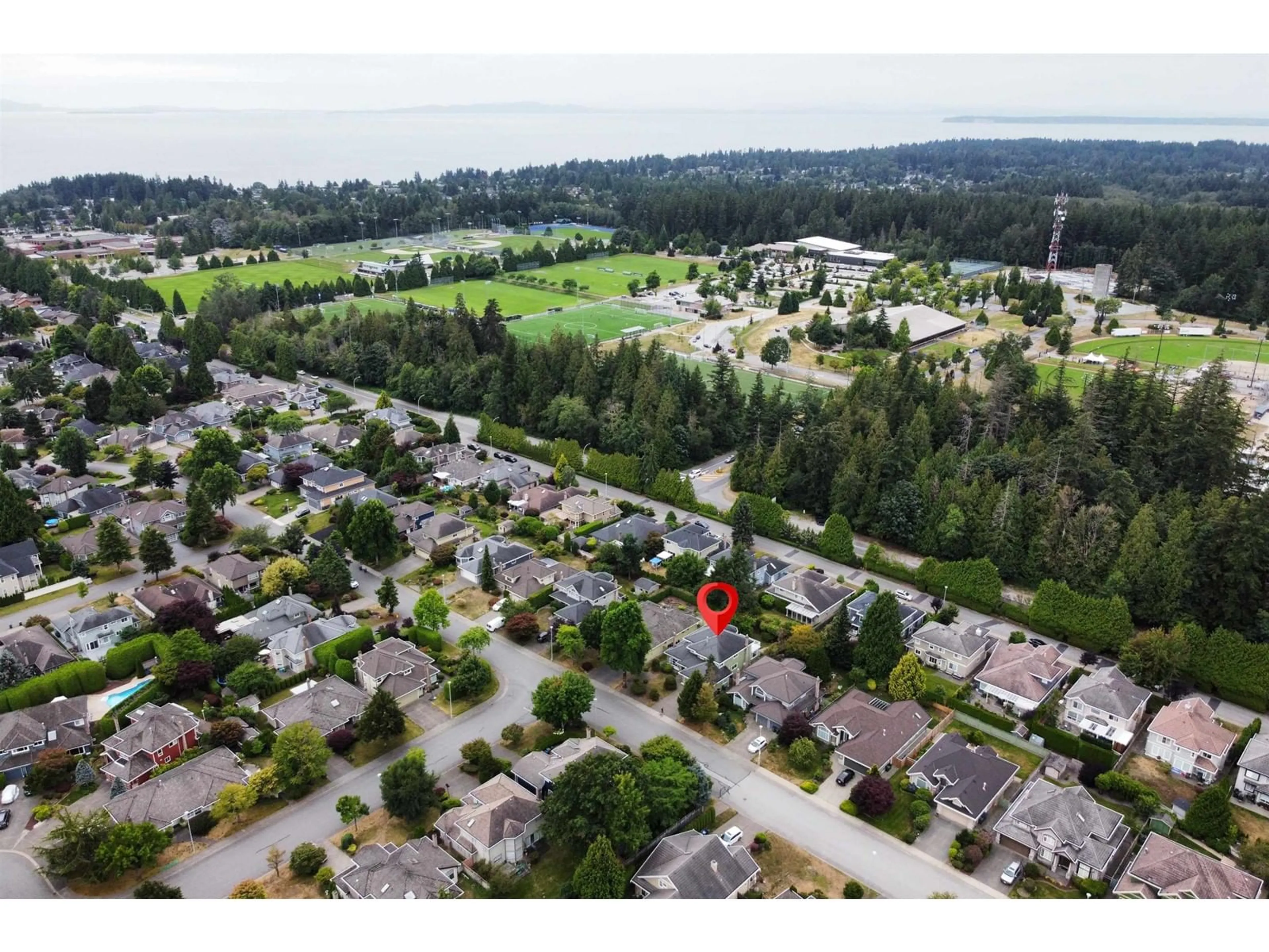 A pic from outside/outdoor area/front of a property/back of a property/a pic from drone, water/lake/river/ocean view for 2219 148A STREET, Surrey British Columbia V4A9J2