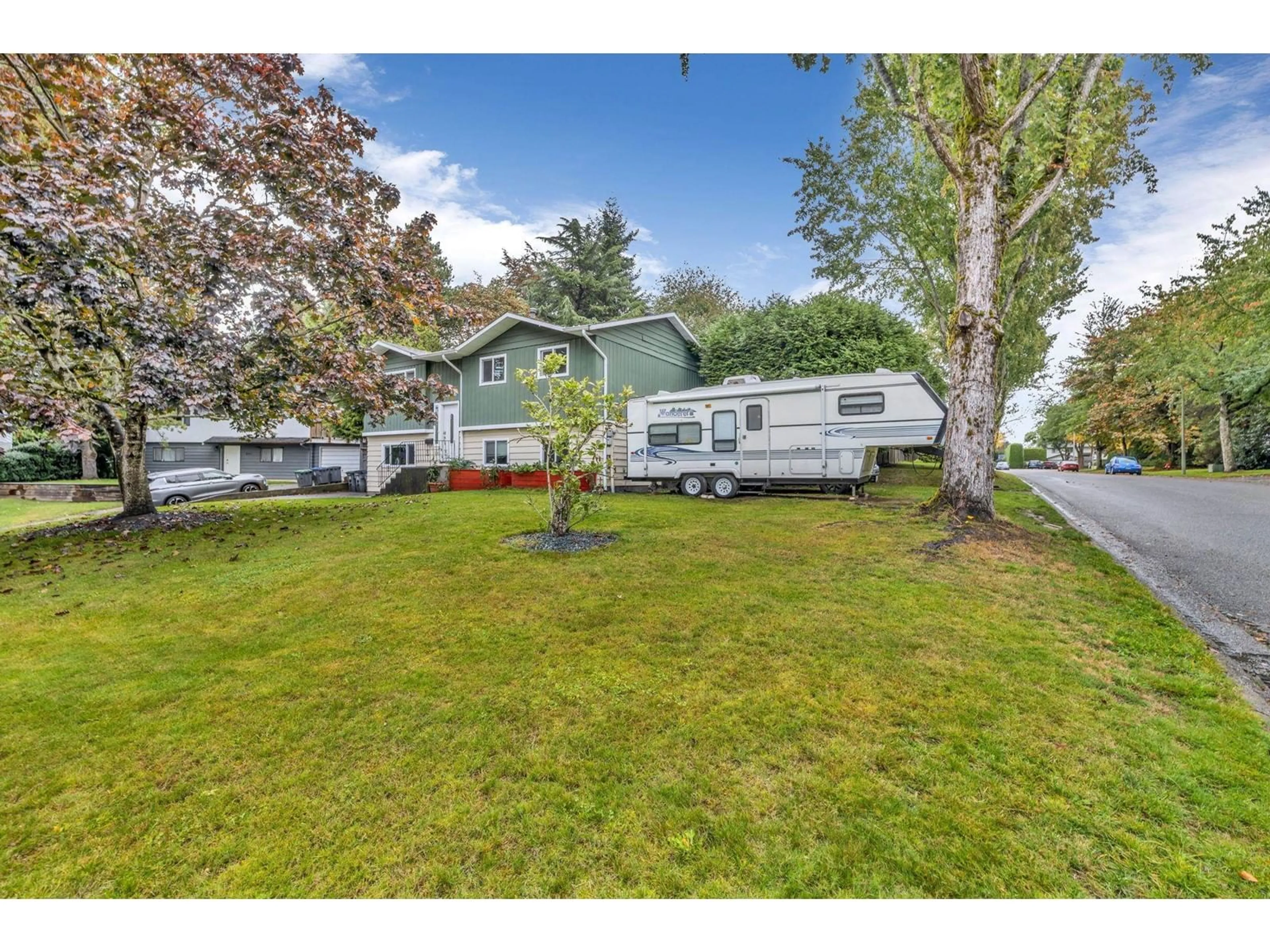 A pic from outside/outdoor area/front of a property/back of a property/a pic from drone, street for 6346 183 STREET, Surrey British Columbia V3S8A8