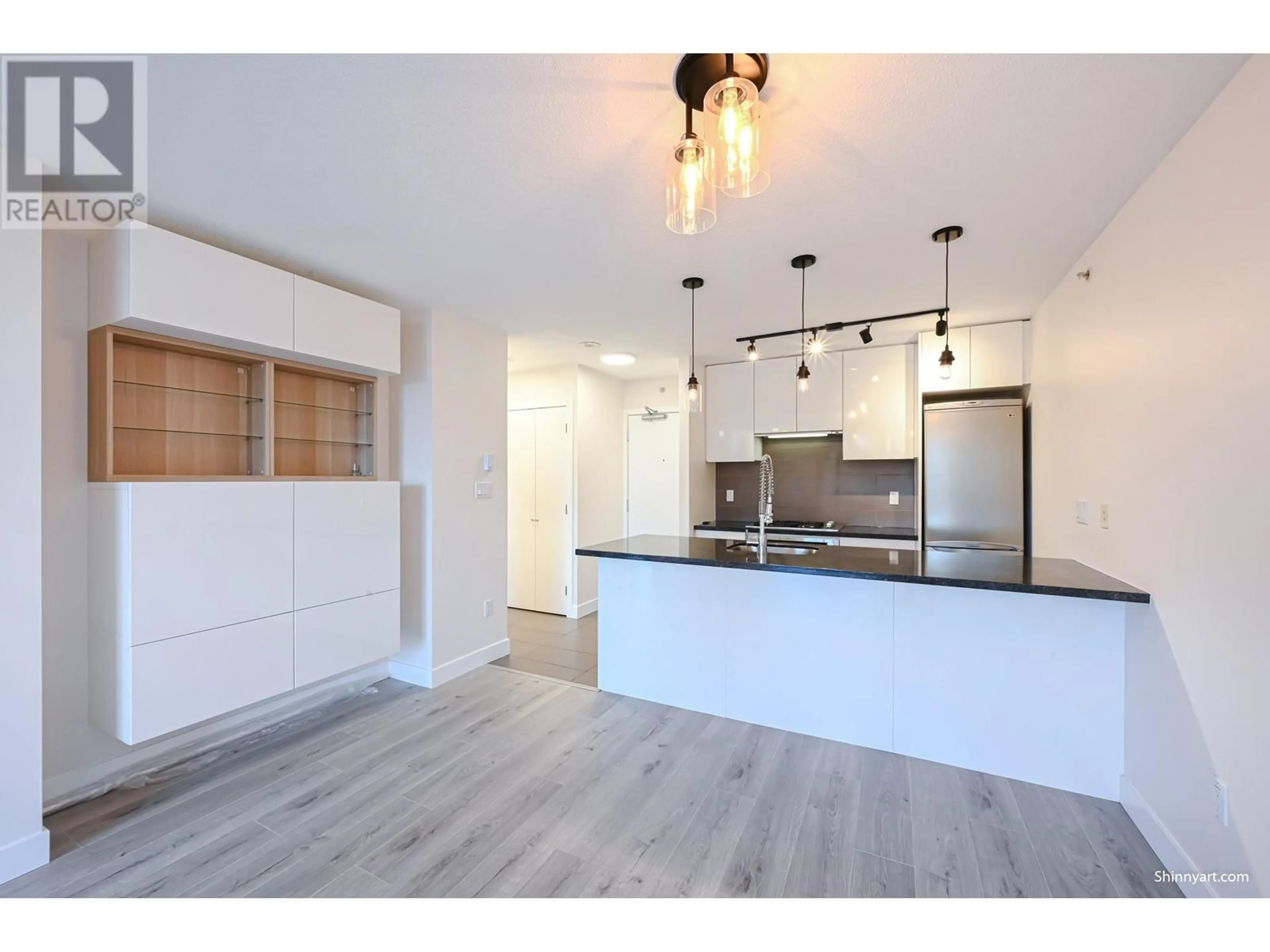 Open concept kitchen, wood/laminate floor for 708 2982 BURLINGTON DRIVE, Coquitlam British Columbia V3B0B3