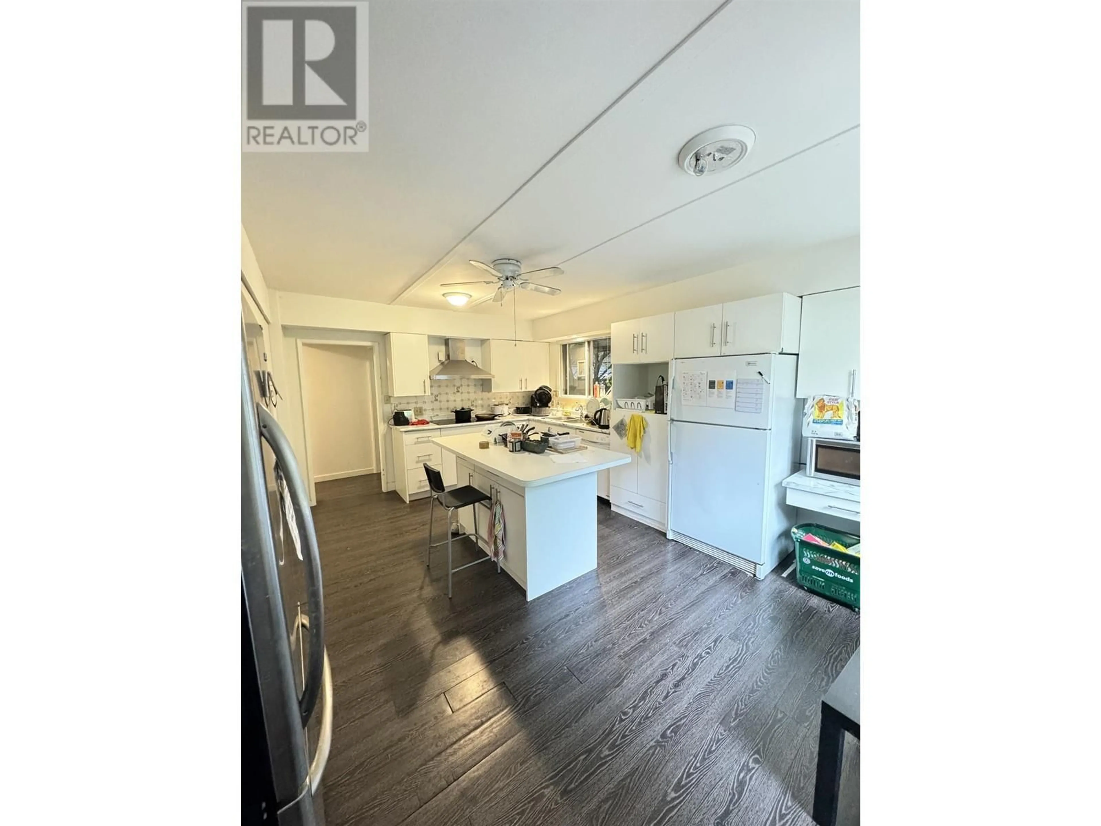 Open concept kitchen, wood/laminate floor for 3019 W 43RD AVENUE, Vancouver British Columbia V6N3J4