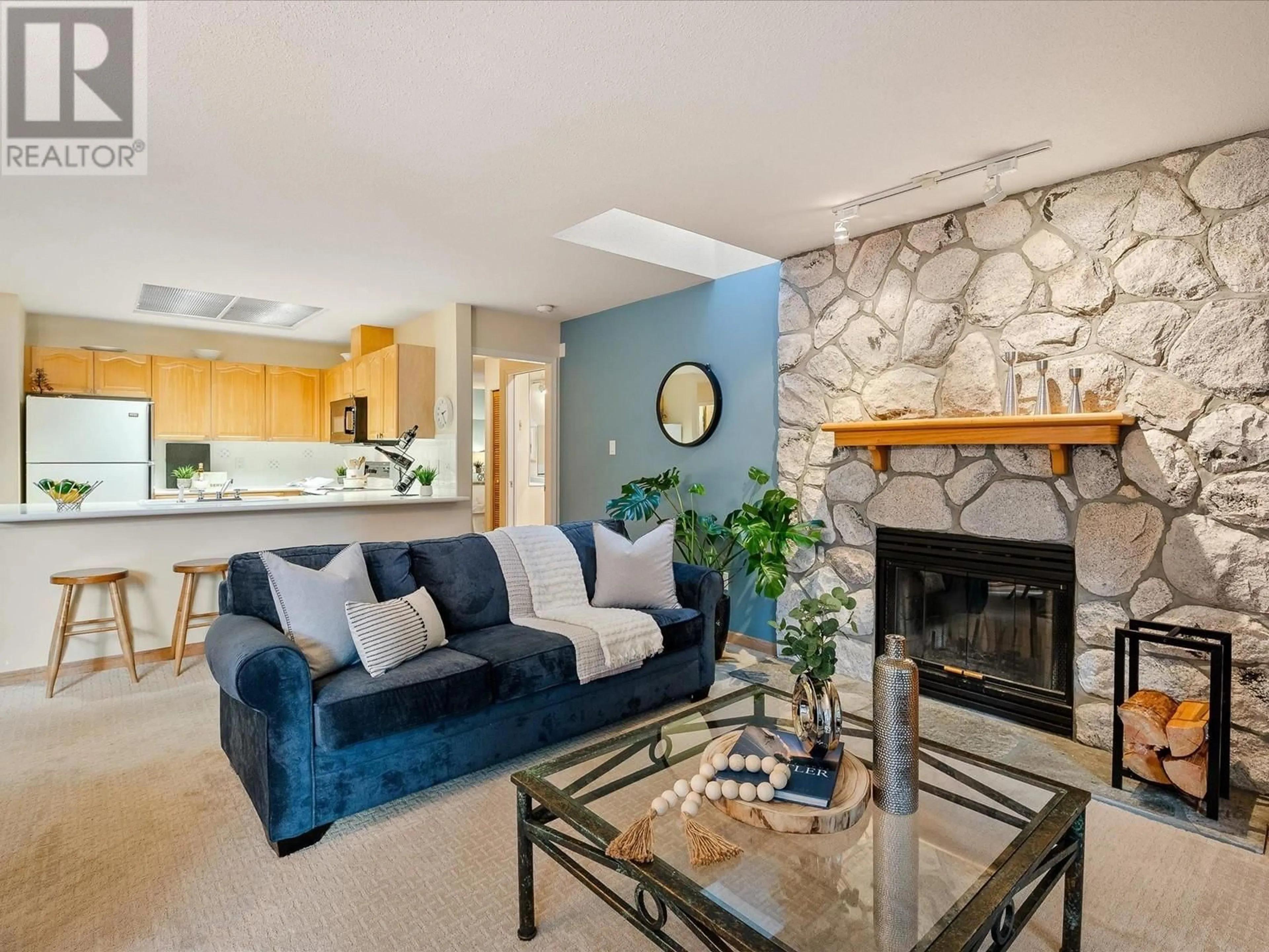 Living room with furniture, ceramic/tile floor for 31 4636 BLACKCOMB WAY, Whistler British Columbia V8E0H2