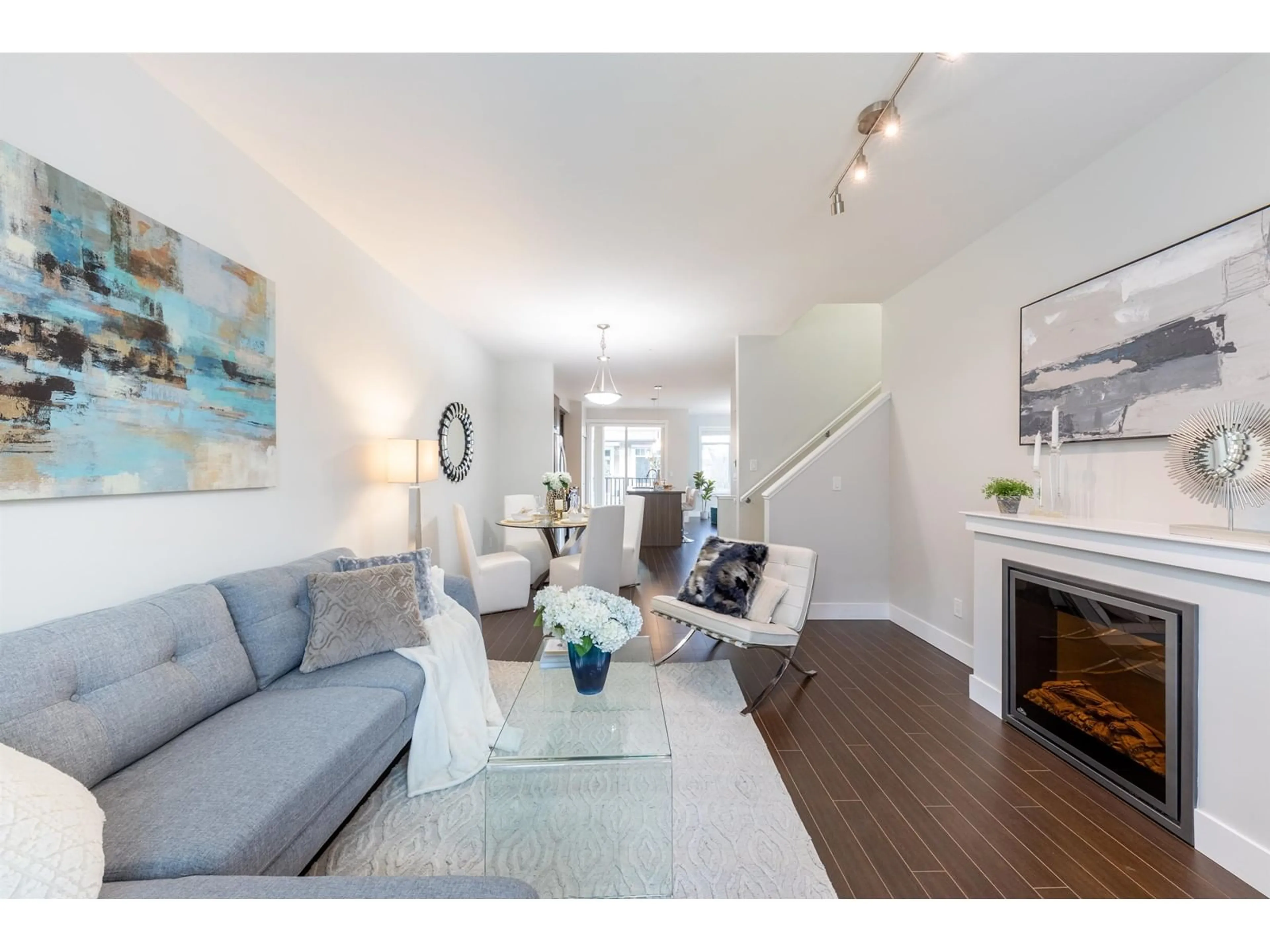 Living room with furniture, wood/laminate floor for 42 - 8250 209B, Langley British Columbia V2Y0J7
