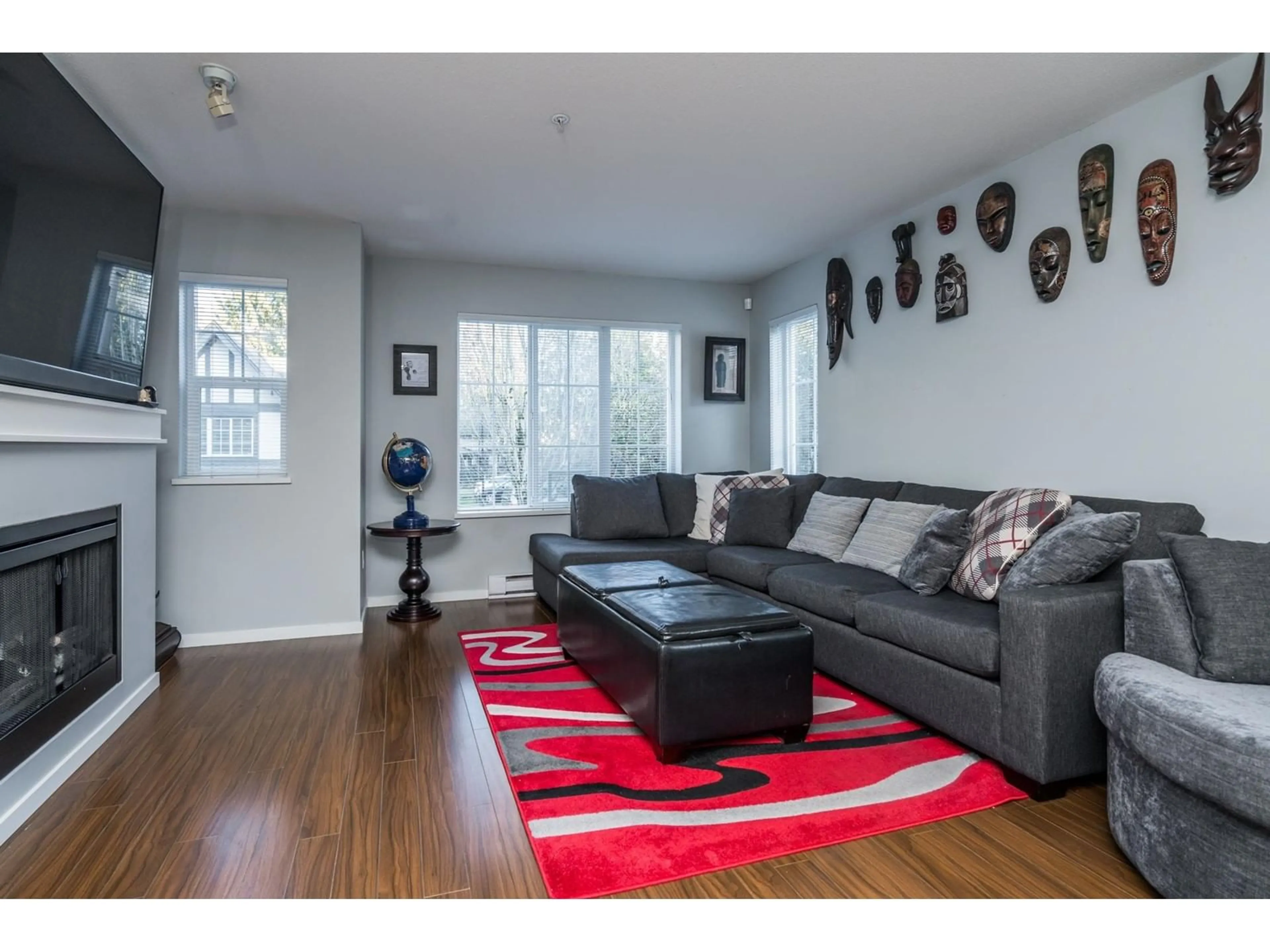 Living room with furniture, wood/laminate floor for 20 20875 80 AVENUE, Langley British Columbia V2Y0B2