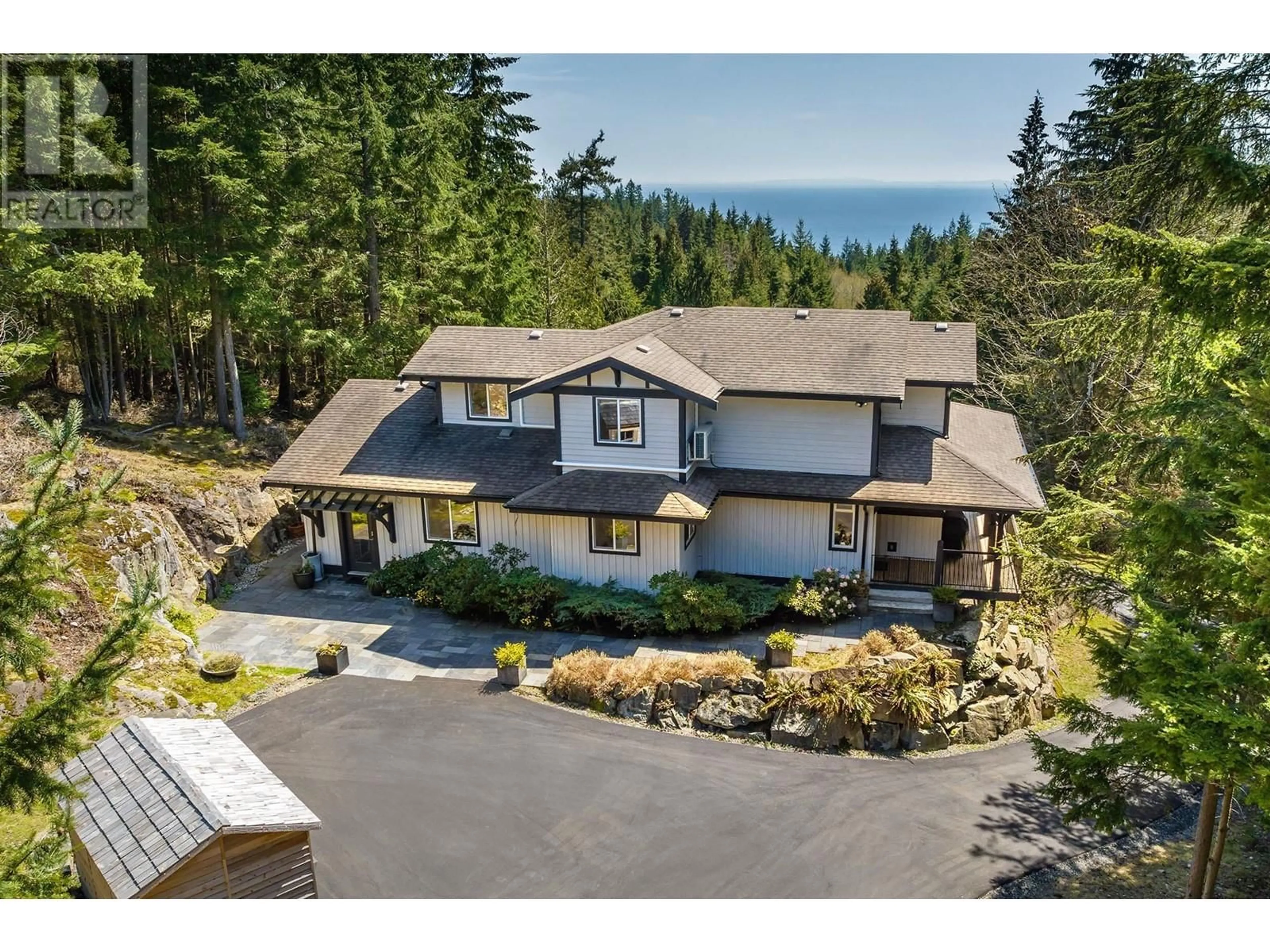 A pic from outside/outdoor area/front of a property/back of a property/a pic from drone, water/lake/river/ocean view for 341 AERIE TREE LANE, Bowen Island British Columbia V0N1G2