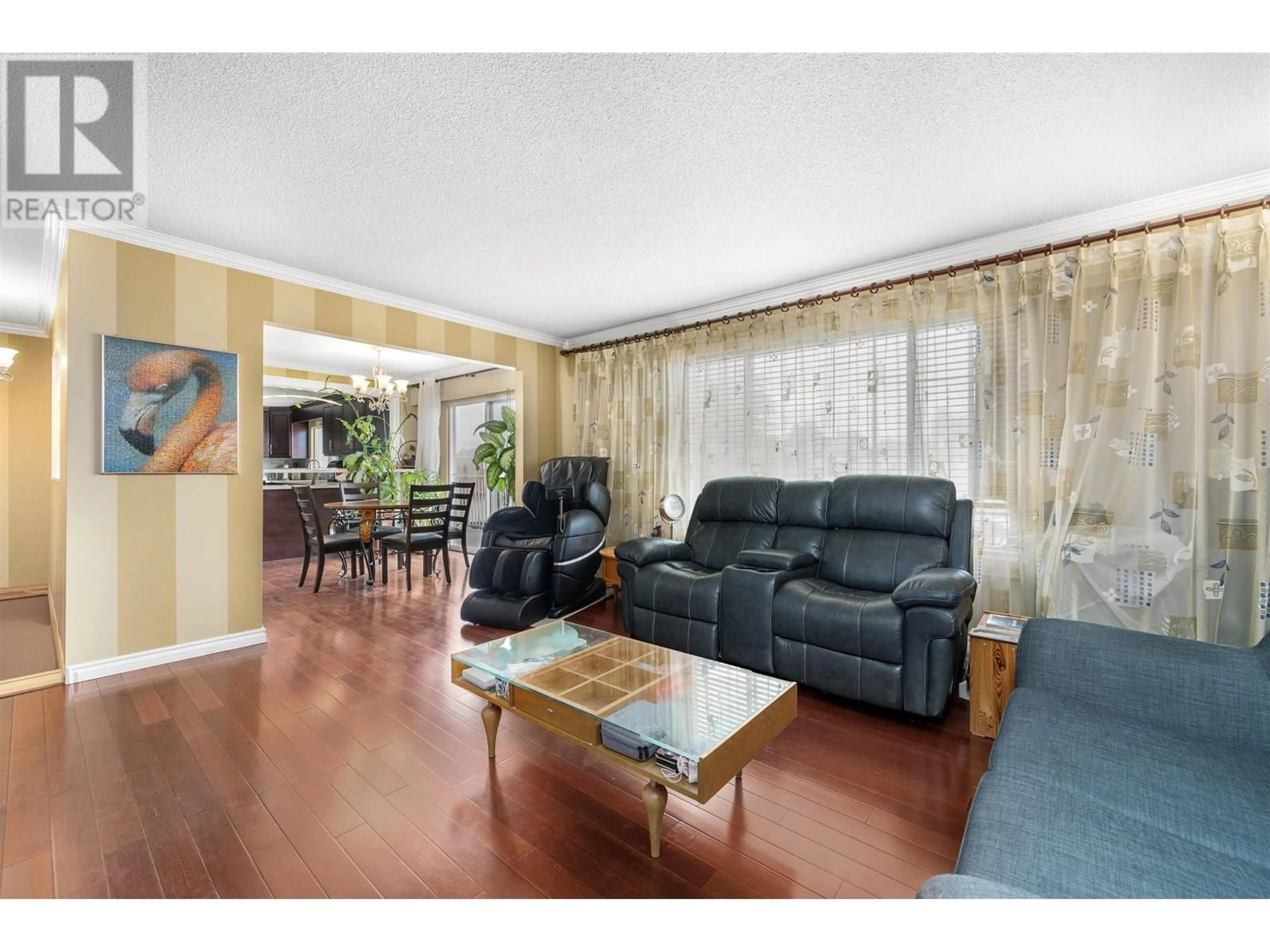 Living room with furniture, wood/laminate floor for 4051 AMUNDSEN PLACE, Richmond British Columbia V7C4L9