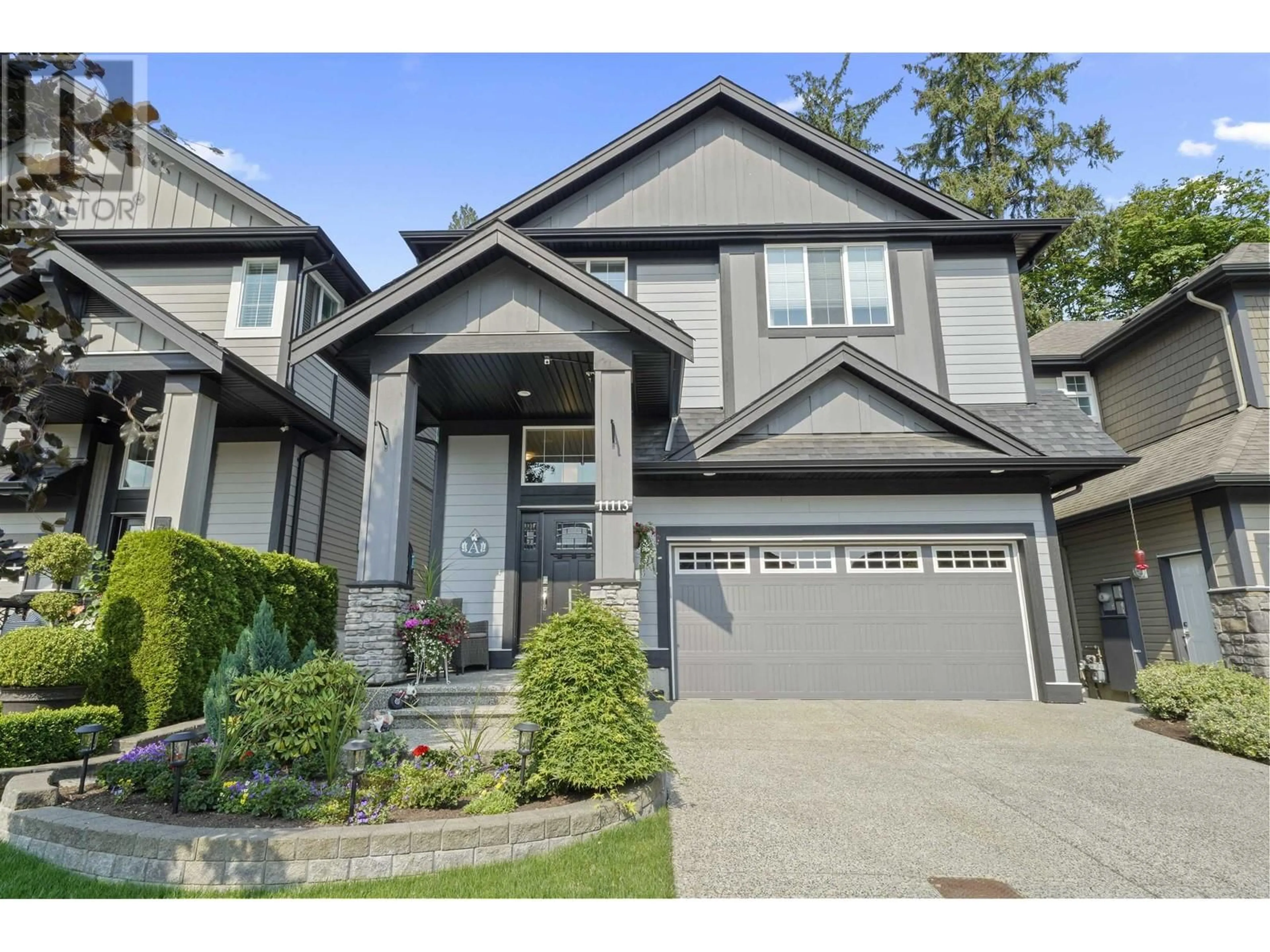 Home with vinyl exterior material, street for 11113 239 STREET, Maple Ridge British Columbia V2W0H7