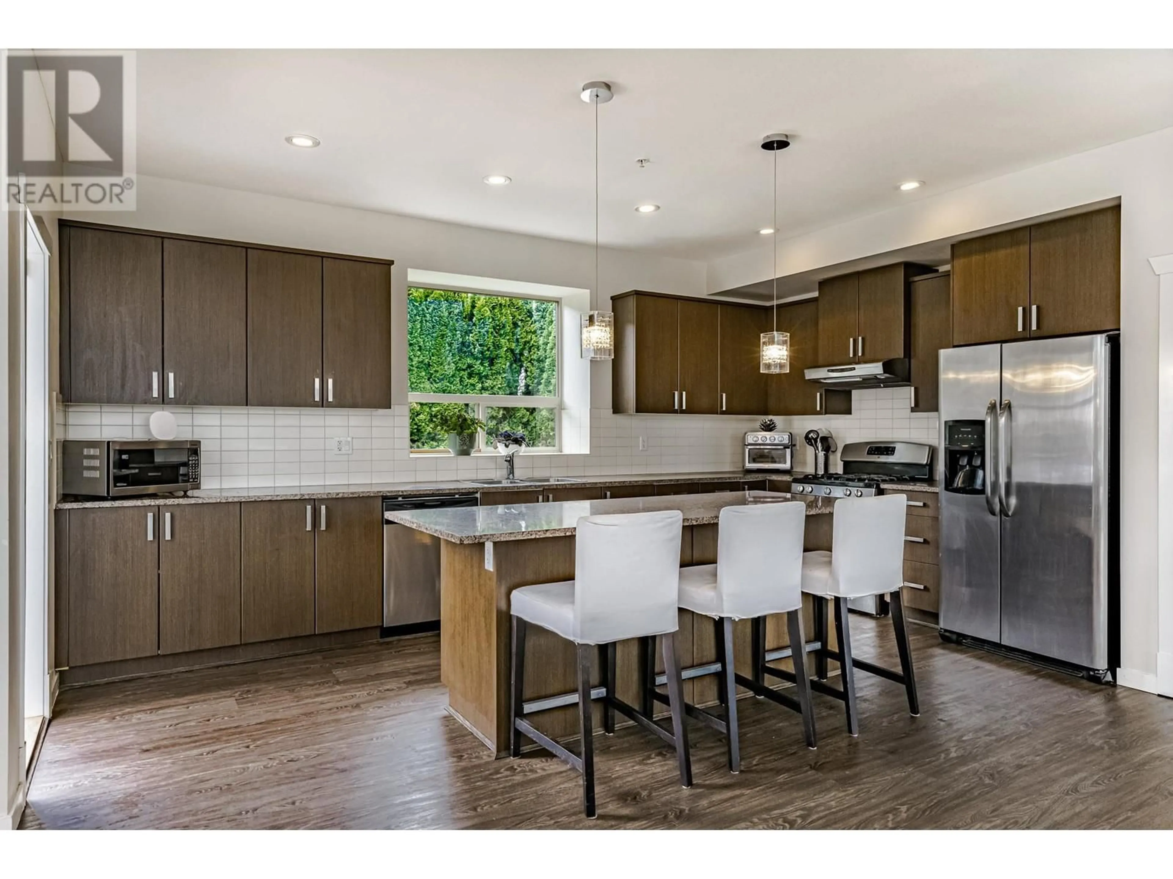 Open concept kitchen, wood/laminate floor for 10715 BEECHAM PLACE, Maple Ridge British Columbia V2W0E9