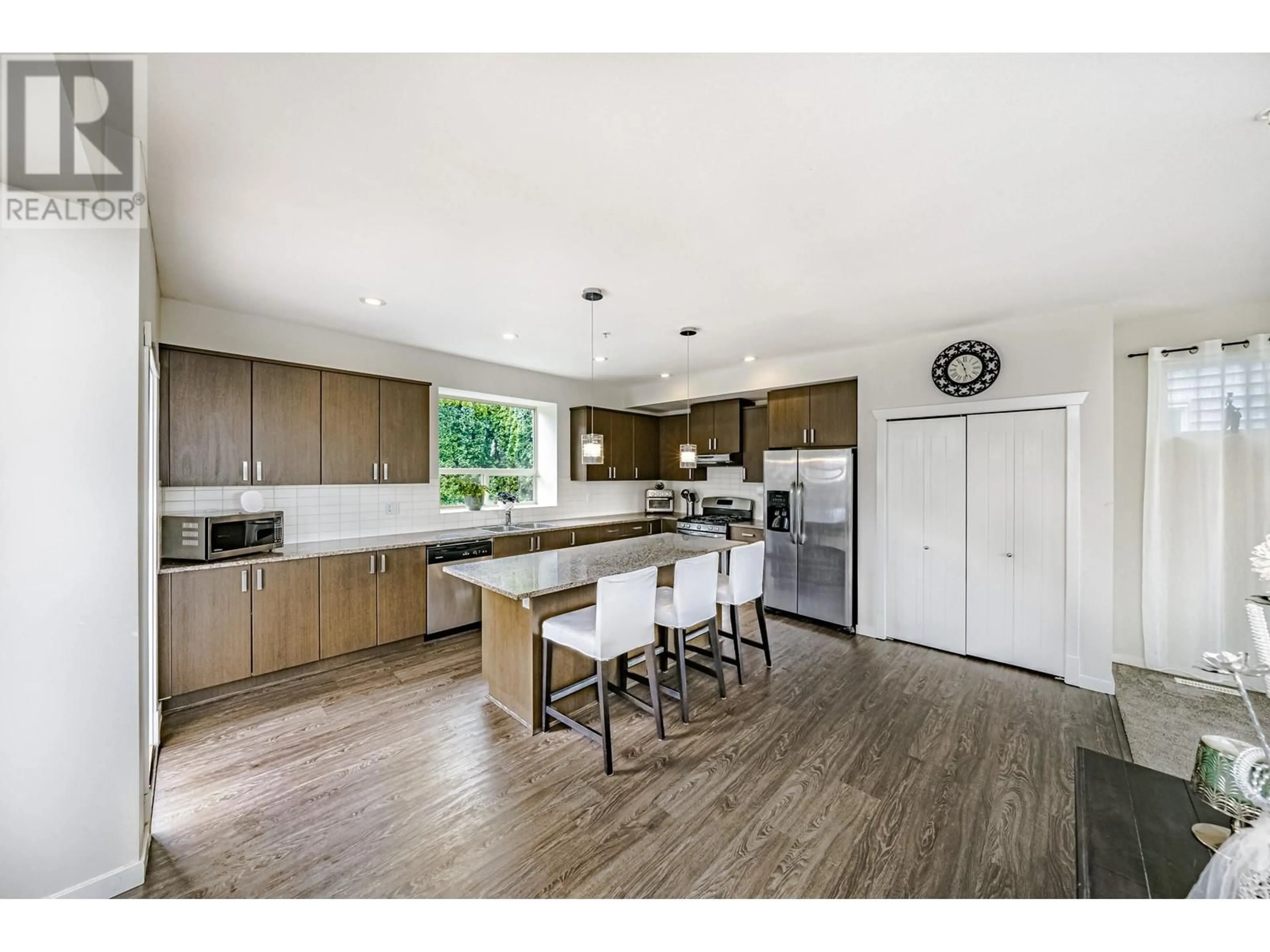 Open concept kitchen, wood/laminate floor for 10715 BEECHAM PLACE, Maple Ridge British Columbia V2W0E9