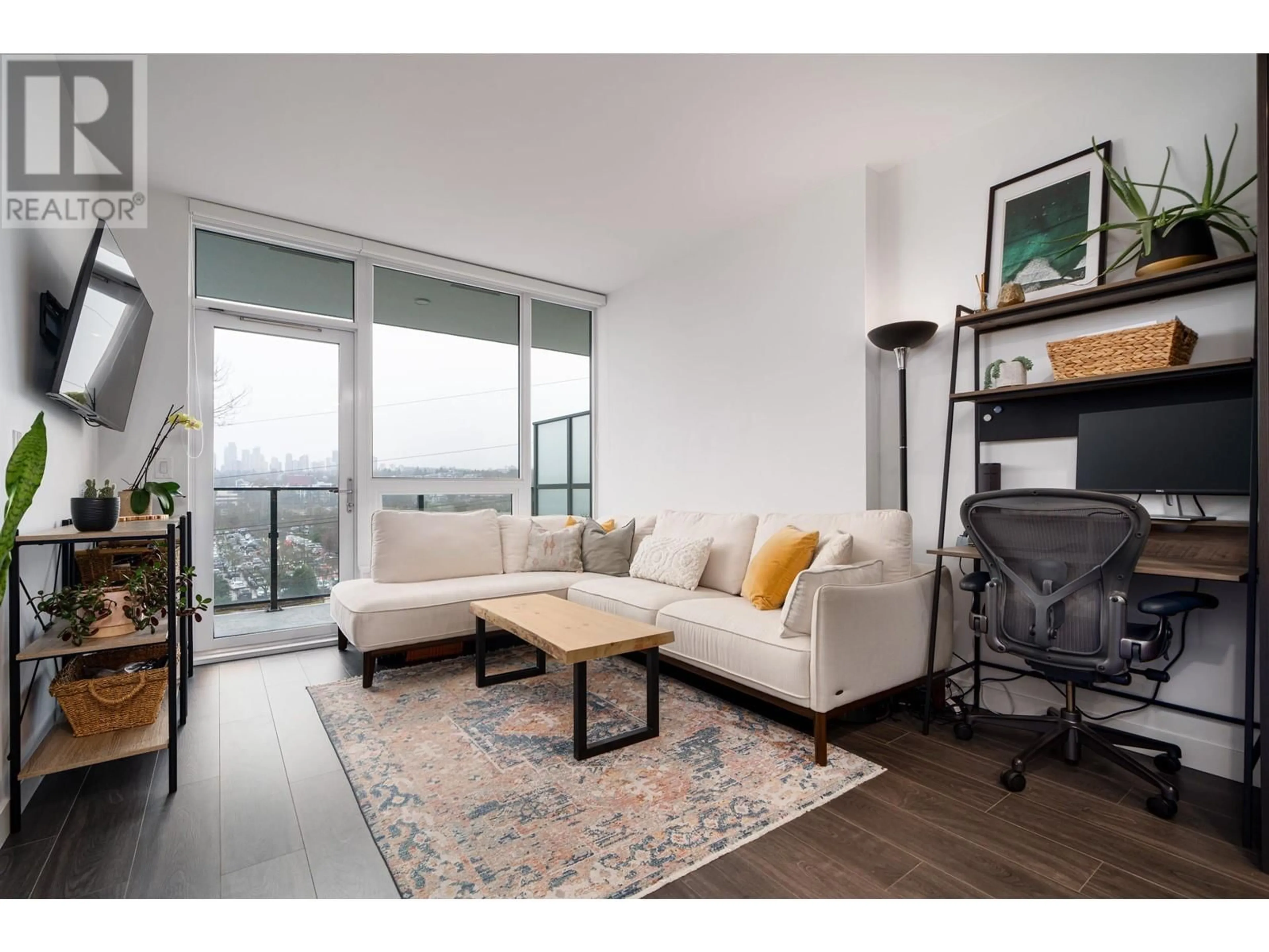 Living room with furniture, wood/laminate floor for 404 2425 ALPHA AVENUE, Burnaby British Columbia V5C0N6