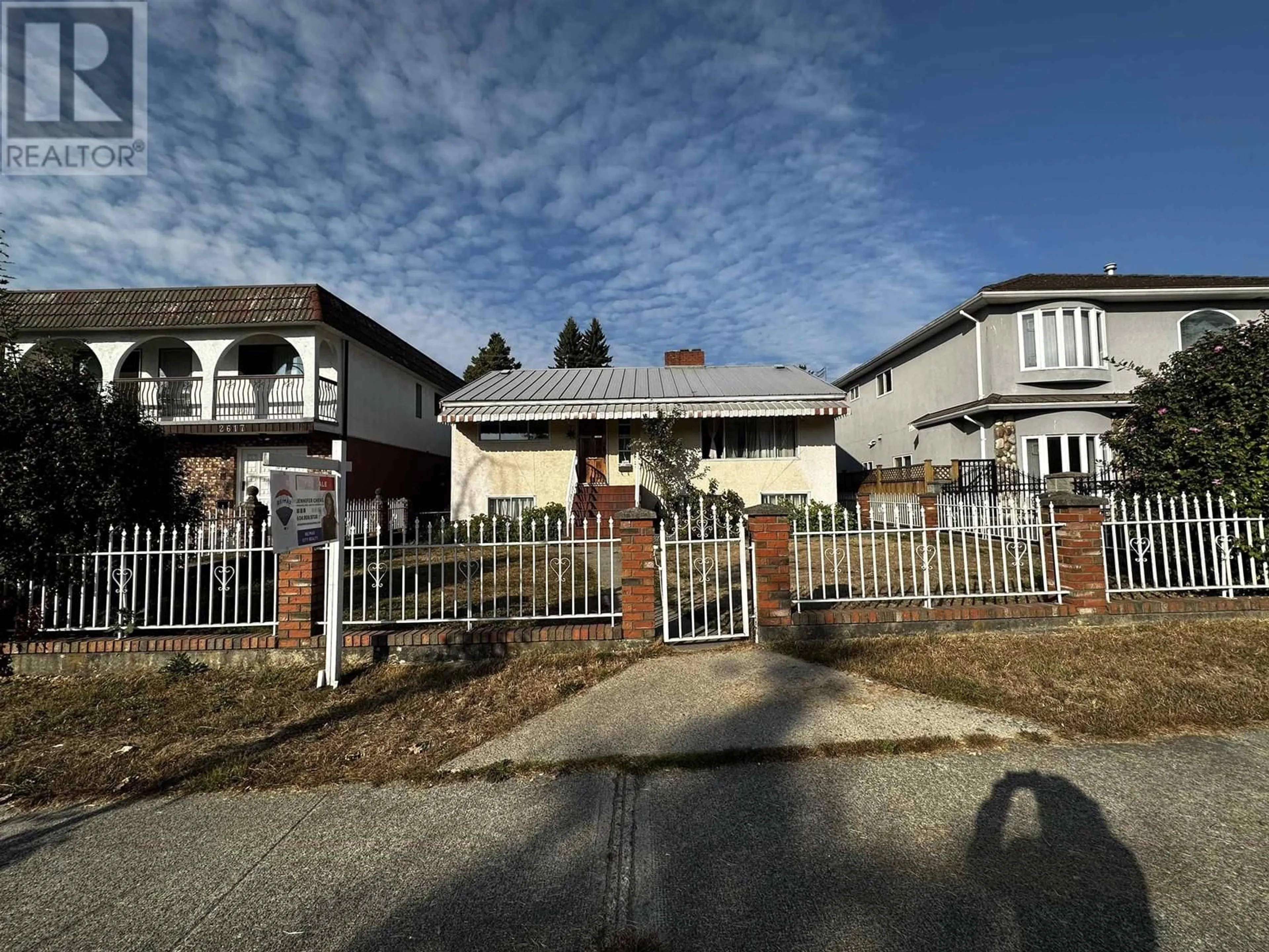 Home with brick exterior material, street for 2621 E 8TH AVENUE, Vancouver British Columbia V5M1W4