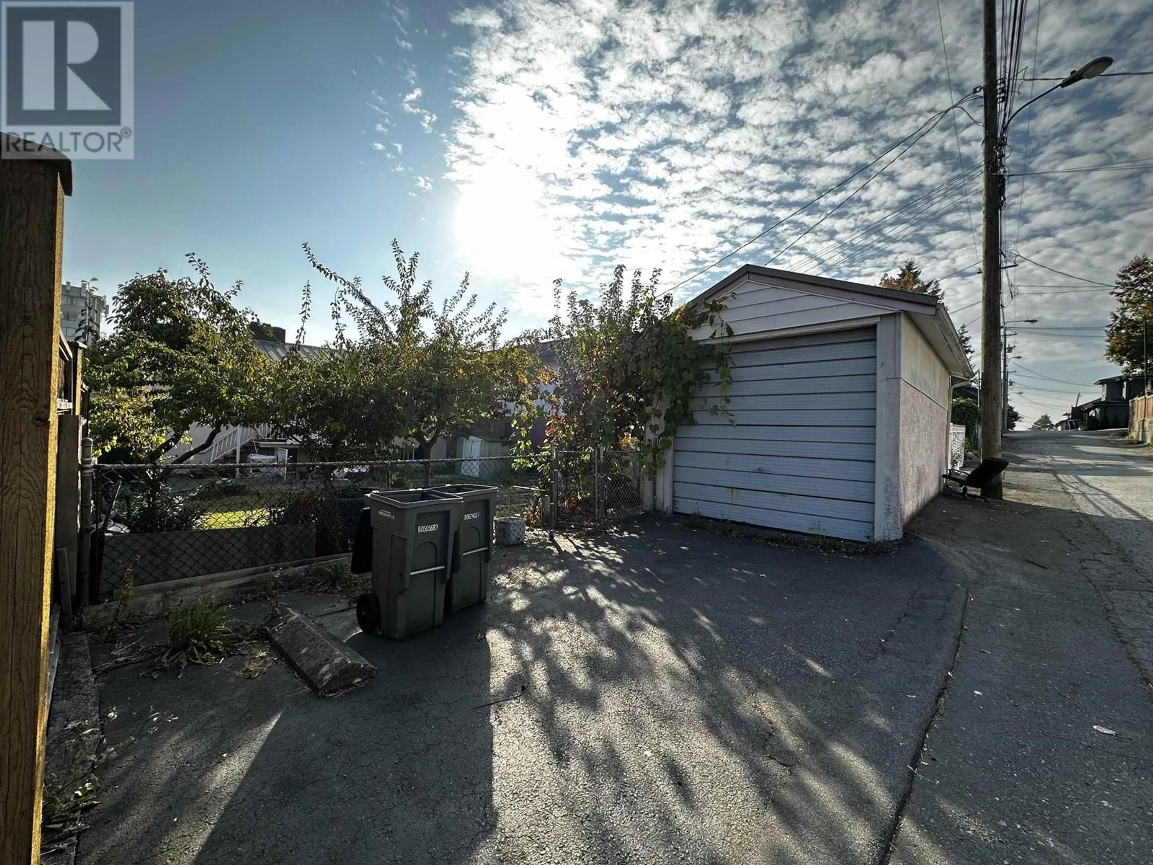 A pic from outside/outdoor area/front of a property/back of a property/a pic from drone, street for 2621 E 8TH AVENUE, Vancouver British Columbia V5M1W4