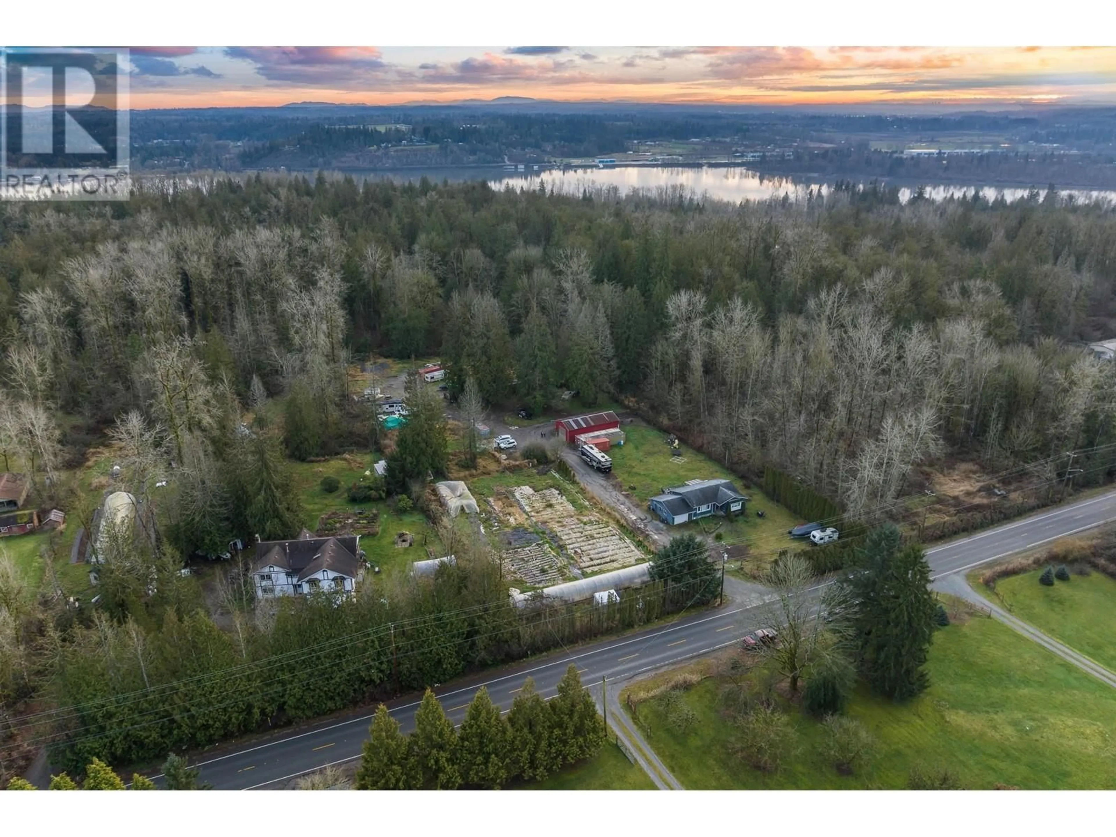 A pic from outside/outdoor area/front of a property/back of a property/a pic from drone, water/lake/river/ocean view for 24950 100 AVENUE, Maple Ridge British Columbia V2W1S3