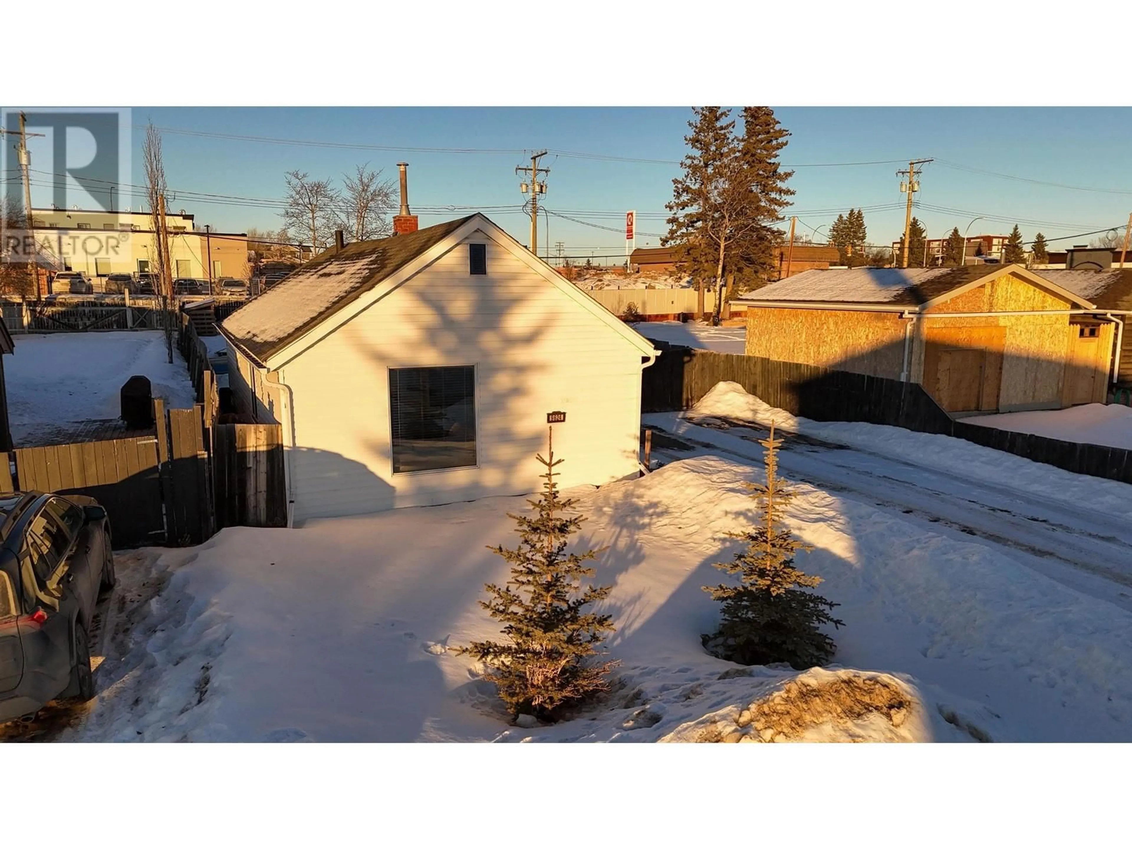 A pic from outside/outdoor area/front of a property/back of a property/a pic from drone, street for 9624 99 AVENUE, Fort St. John British Columbia V1J1T8