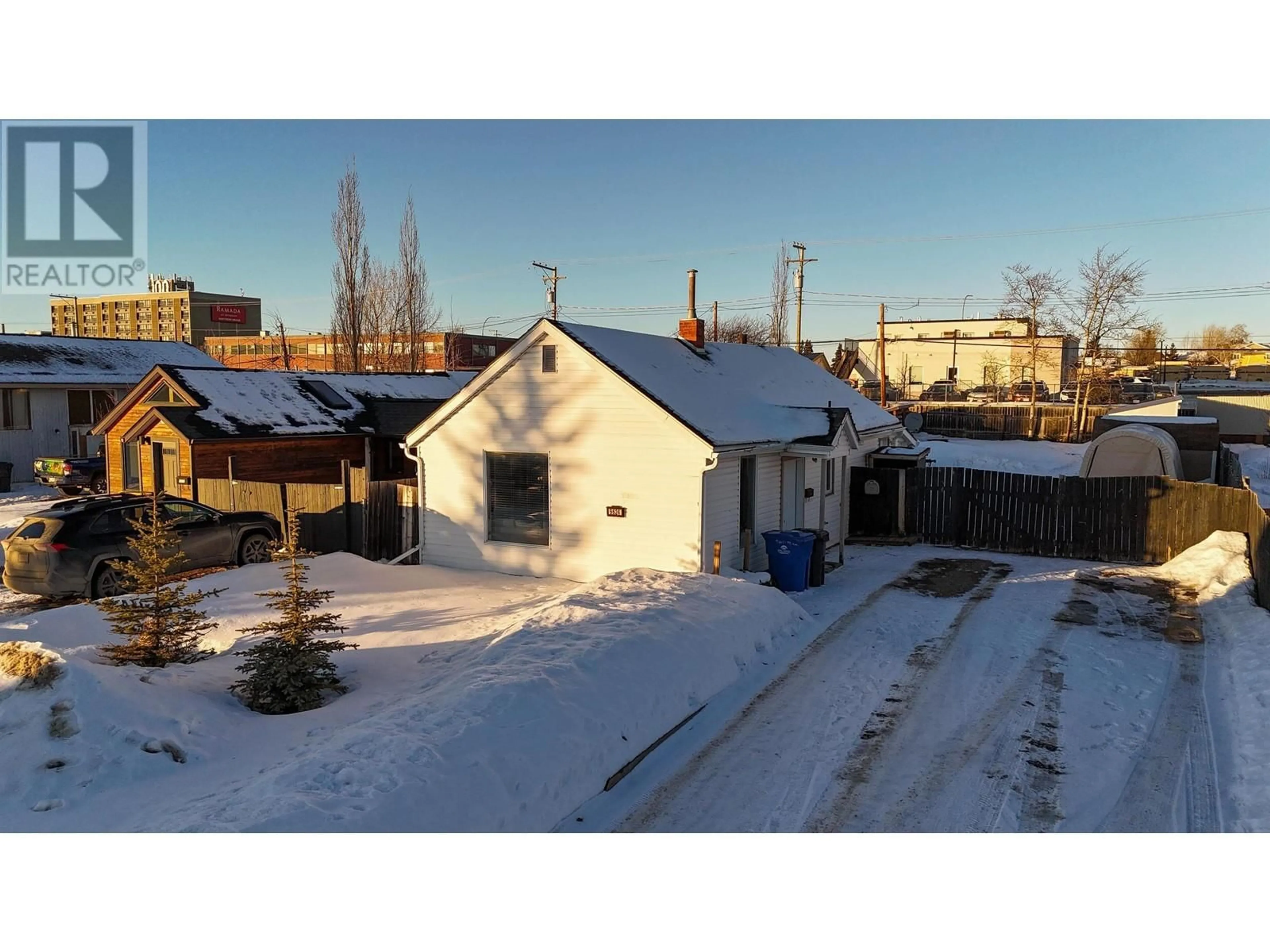 A pic from outside/outdoor area/front of a property/back of a property/a pic from drone, street for 9624 99 AVENUE, Fort St. John British Columbia V1J1T8