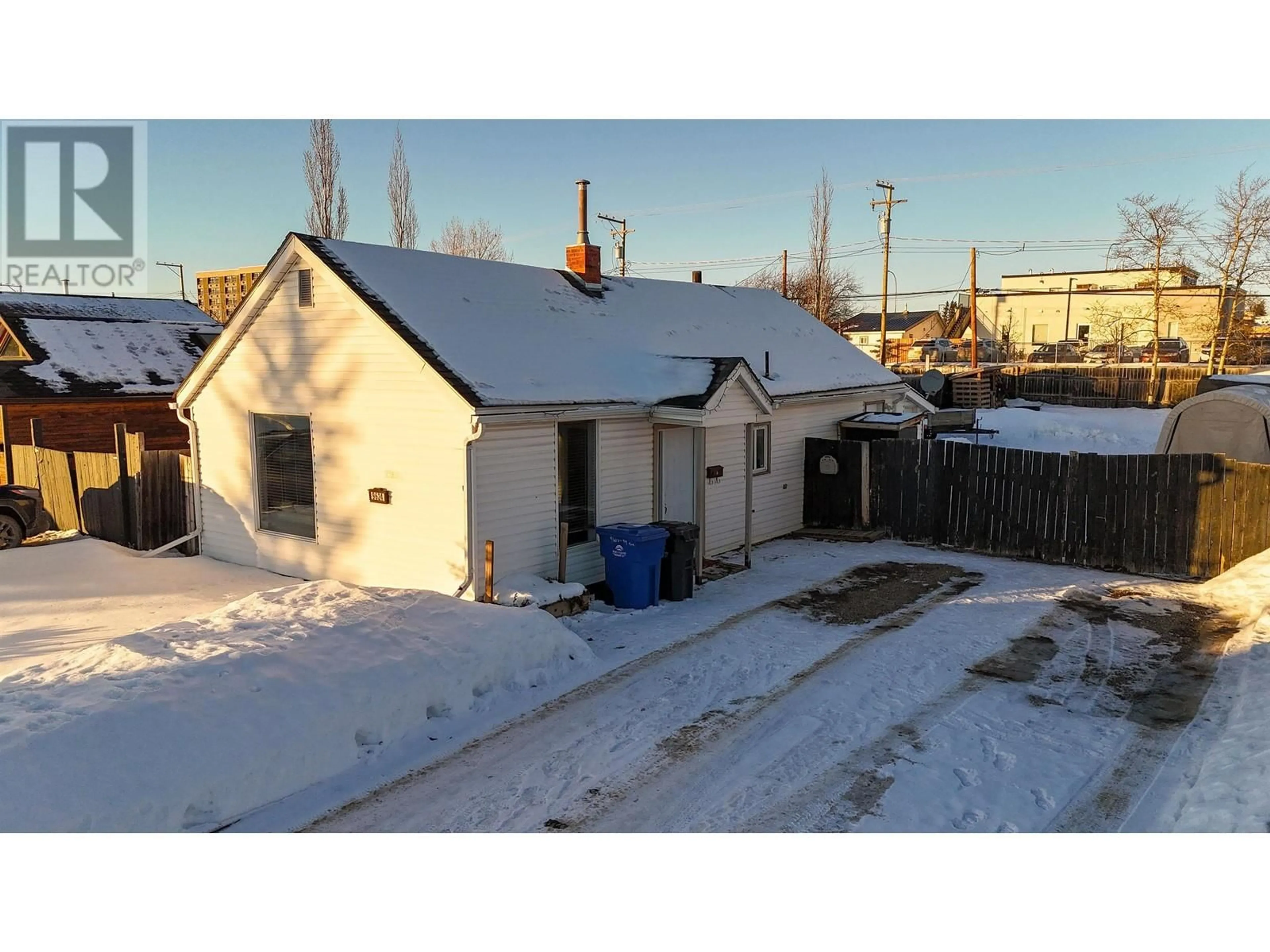 A pic from outside/outdoor area/front of a property/back of a property/a pic from drone, street for 9624 99 AVENUE, Fort St. John British Columbia V1J1T8