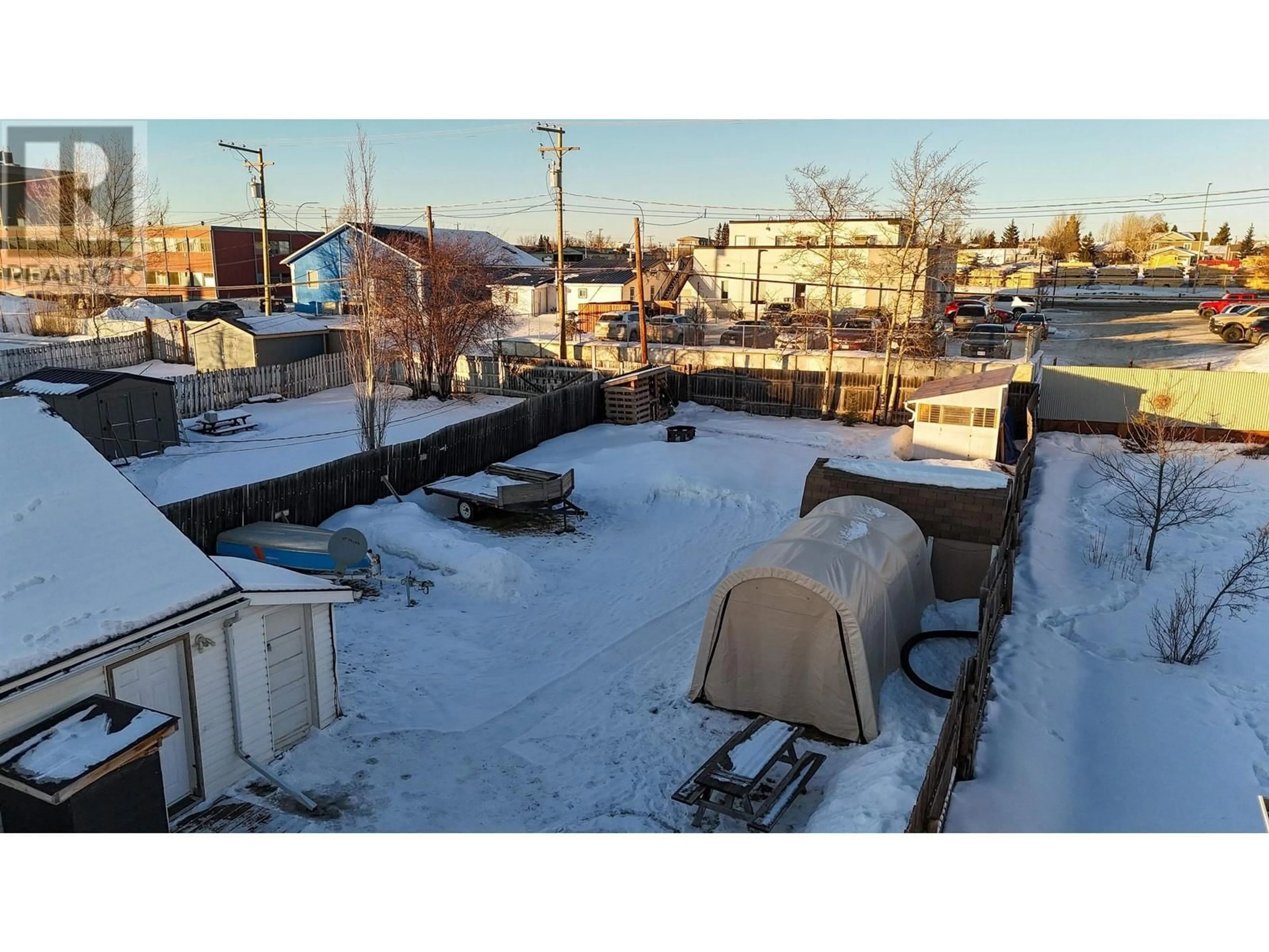 A pic from outside/outdoor area/front of a property/back of a property/a pic from drone, unknown for 9624 99 AVENUE, Fort St. John British Columbia V1J1T8