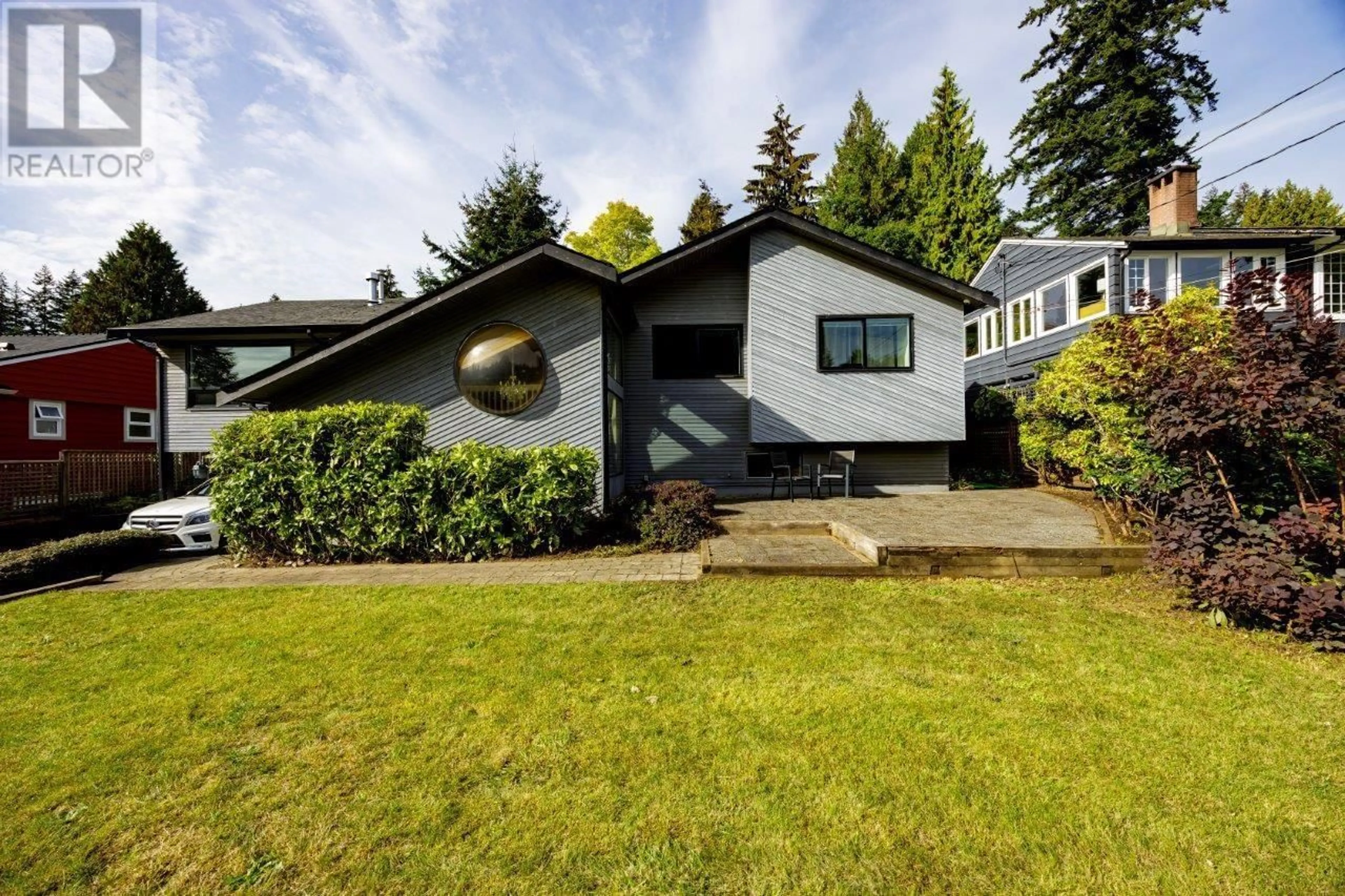 Home with vinyl exterior material, street for 1427 APPIN ROAD, North Vancouver British Columbia V7J2T4