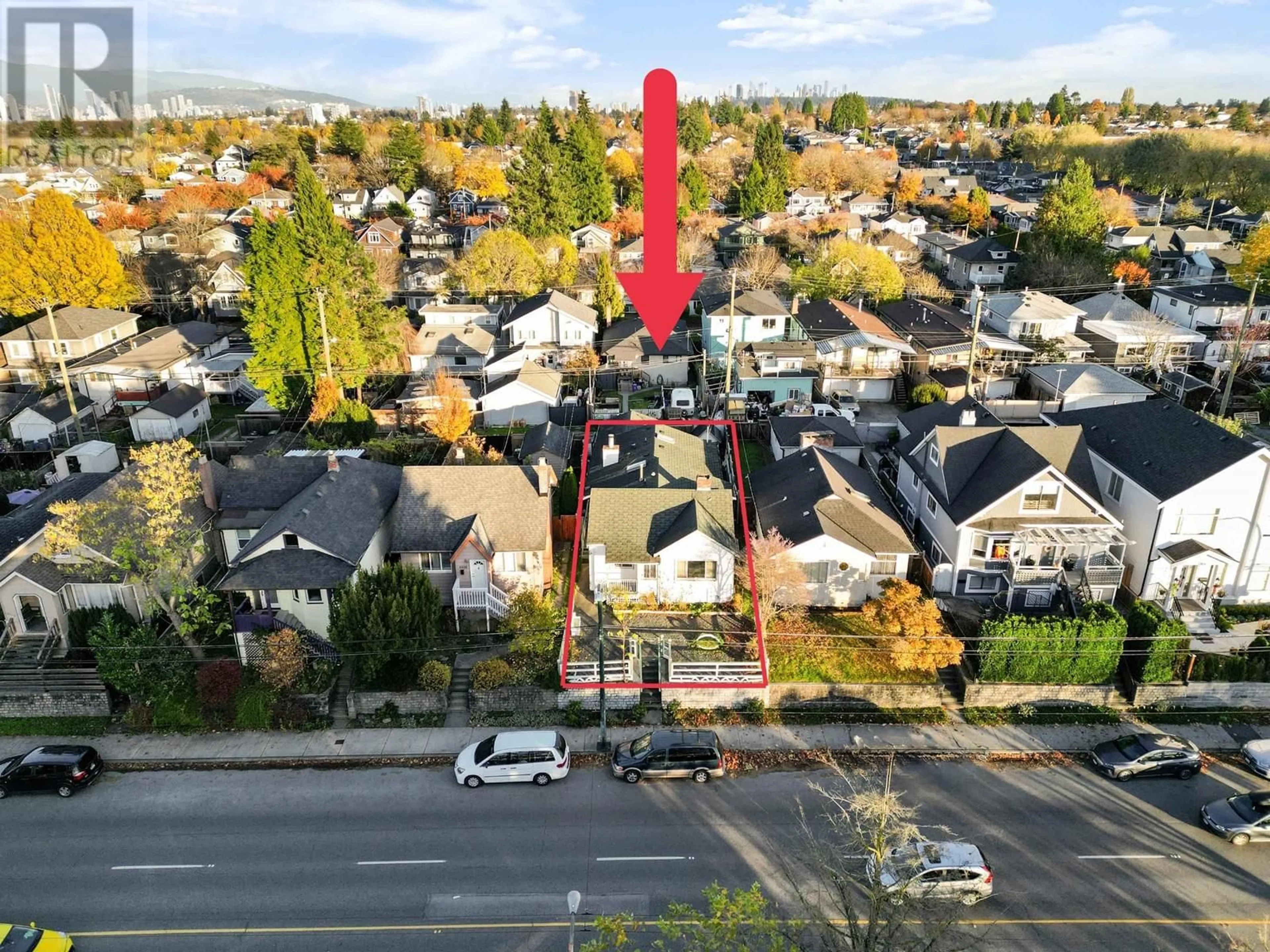 A pic from outside/outdoor area/front of a property/back of a property/a pic from drone, street for 5266 FRASER STREET, Vancouver British Columbia V5W2Y9