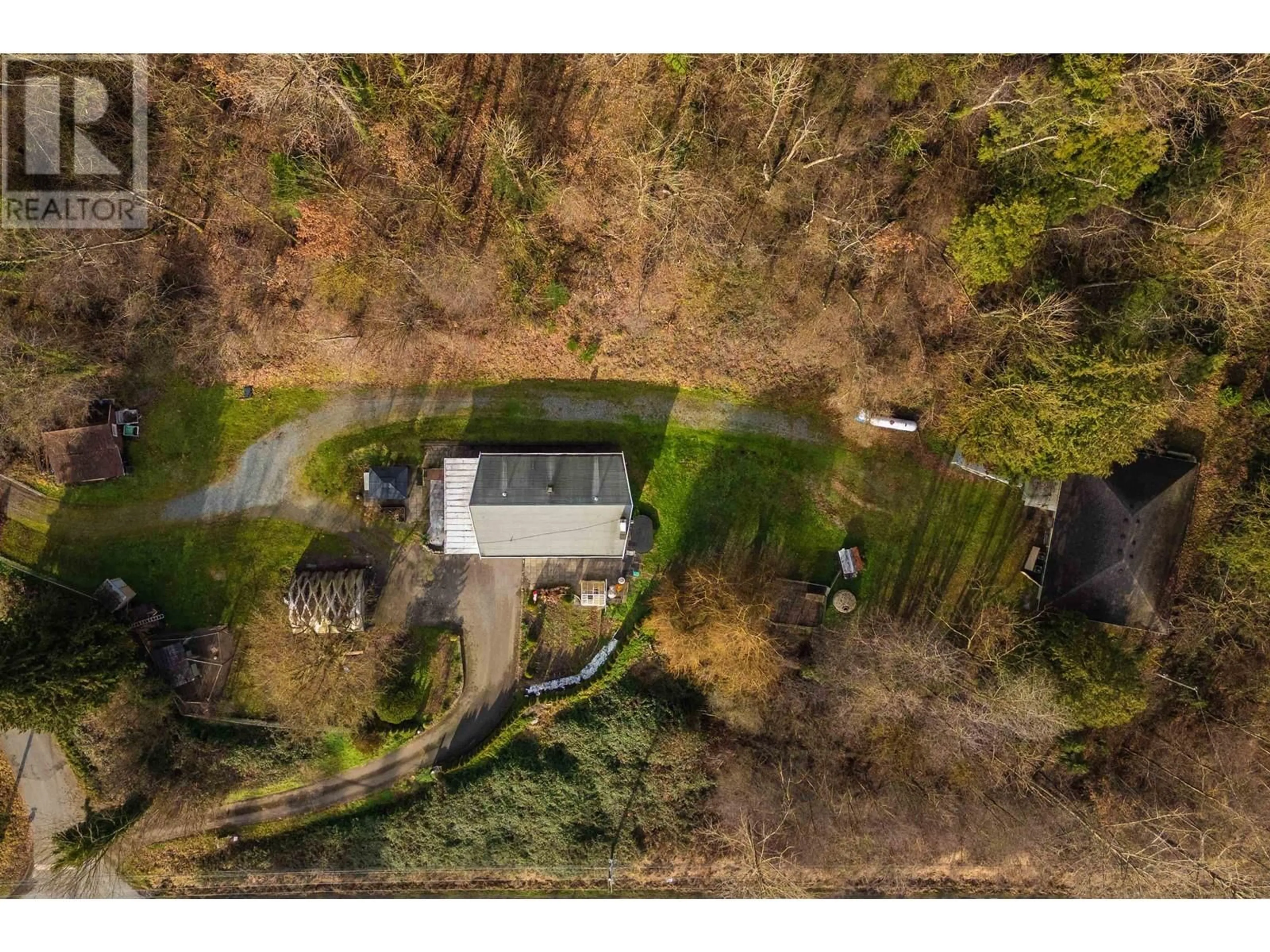 A pic from outside/outdoor area/front of a property/back of a property/a pic from drone, forest/trees view for 9370 263 STREET, Maple Ridge British Columbia V2W1K3