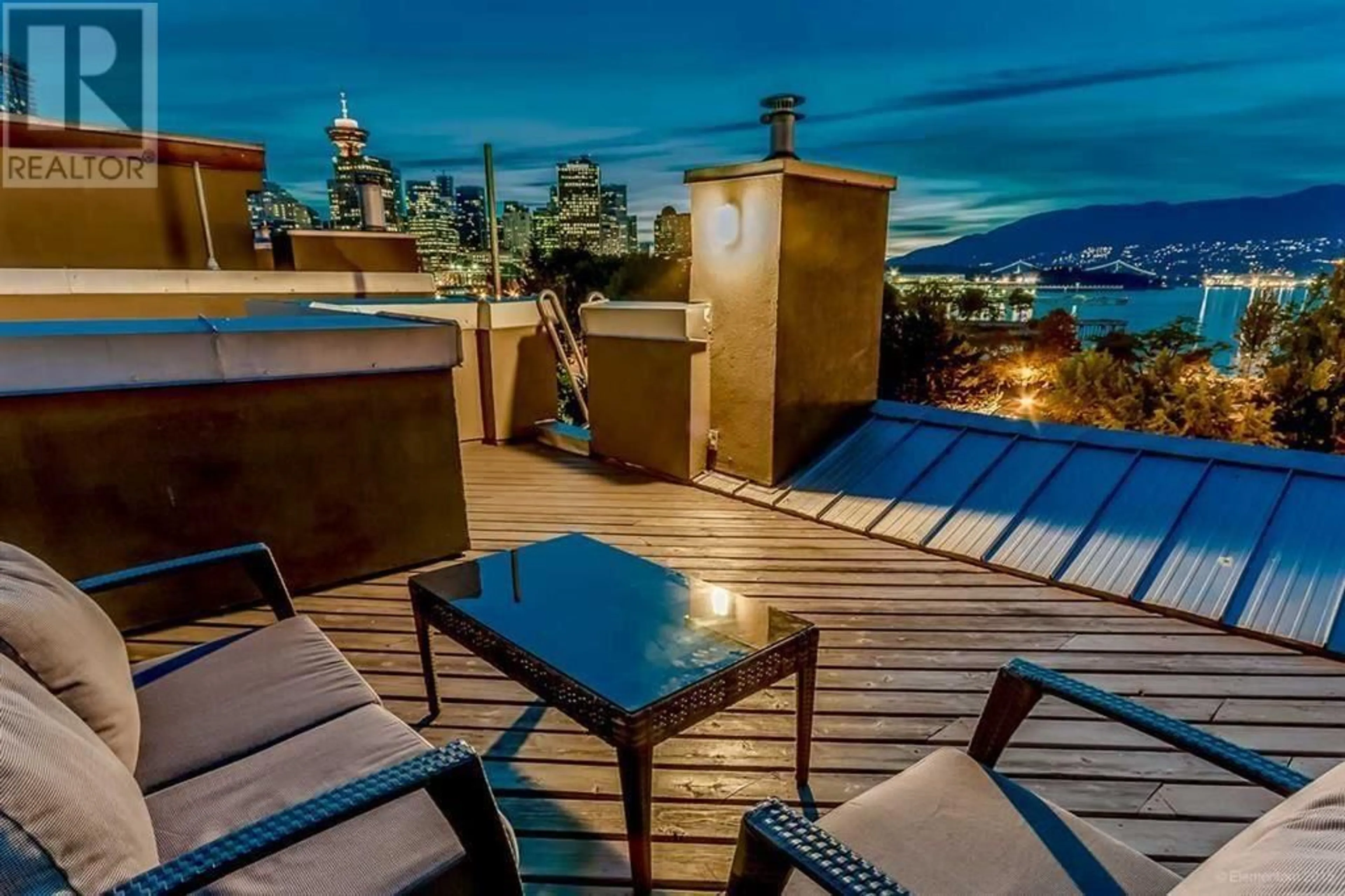 Patio, city buildings view from balcony for 135 ALEXANDER STREET, Vancouver British Columbia V6A1B8